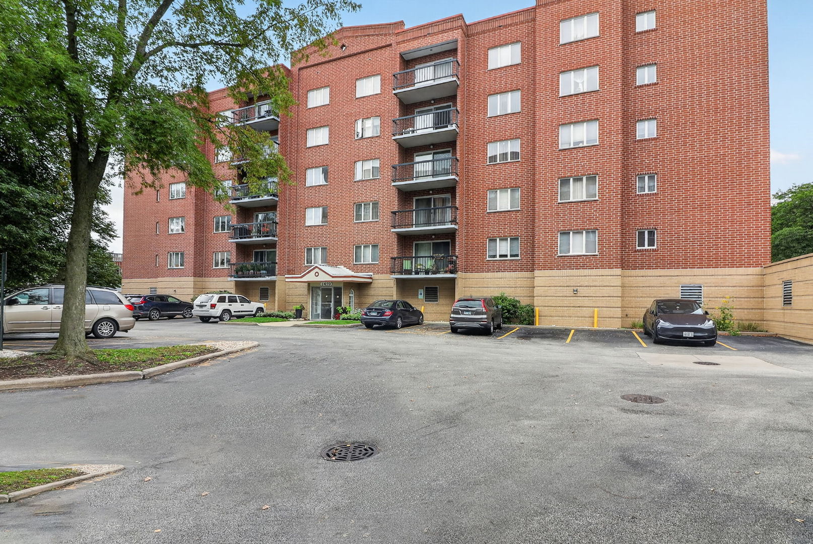 Highly desirable condo in a prime Des Plaines location, just steps from Shopping, Metra train station, Restaurants, and everyday conveniences. This beautifully updated 2-bedroom, 2-bath condo offers garage parking, an elevator, and a rare open floor plan not often found in this building.    The traditional dividing wall between the kitchen and living/dining area has been replaced with a spacious island featuring a granite countertop and seating, creating an open, inviting space ideal for everyday living, casual meals, and entertaining guests. Sleek engineered hardwood floors flow throughout the entire unit, adding to its clean and sophisticated appeal.    Both bathrooms have been remodeled with high-end fixtures and designer finishes. Enjoy the convenience of an in-unit laundry room with a full-size washer and dryer, plus additional private storage located on the same floor.    Step outside onto the large, south-facing private balcony..., perfect for enjoying fresh air, relaxing with your morning coffee. *** The well-maintained, secure building features recently updated common areas.  *** A wonderful combination of location, style, functionality, and convenience.  You will not want to miss this beautiful carefree condo to call  H O M E...!!