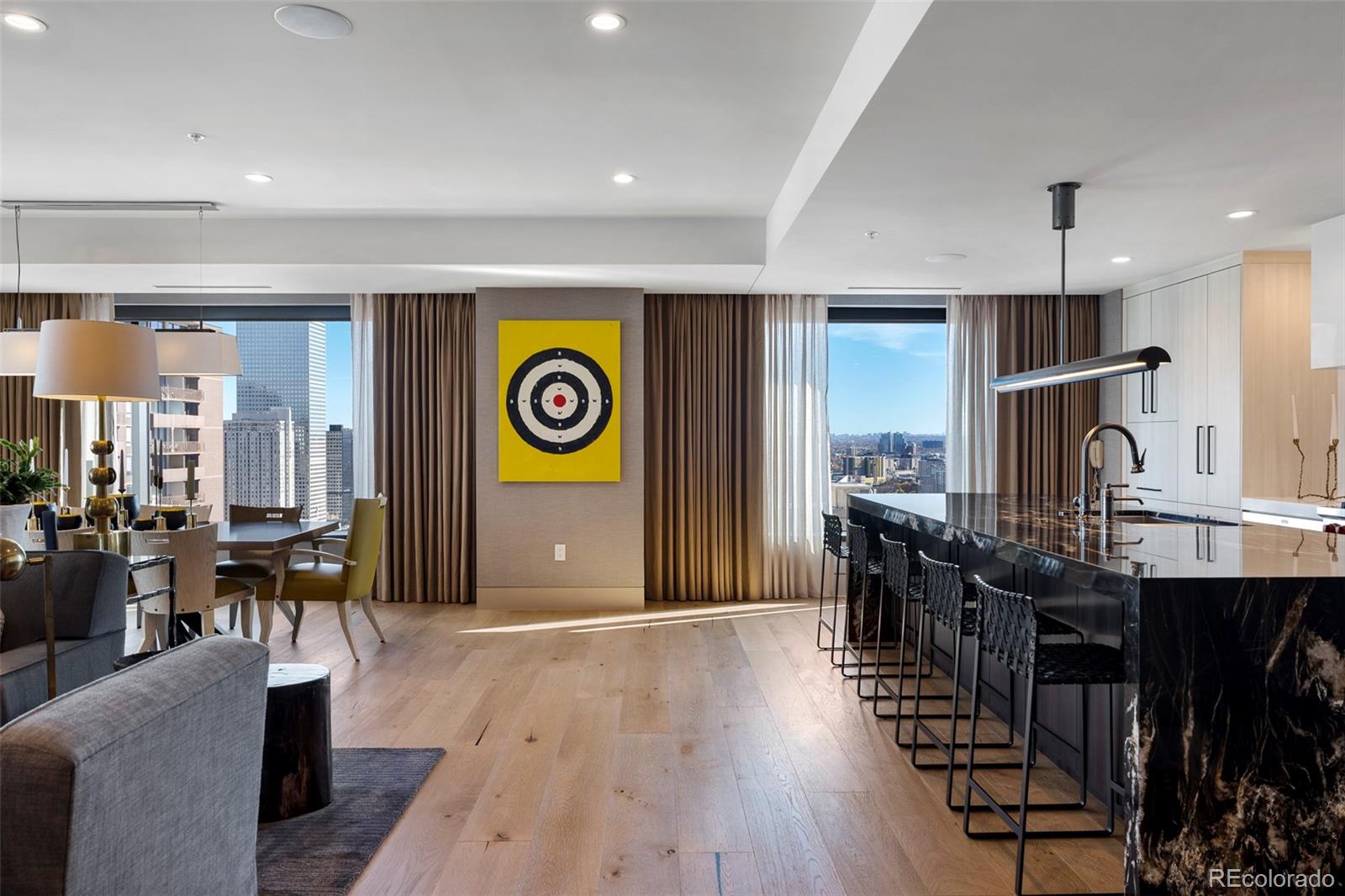 Luxury living is exquisitely redefined in this residence poised within the Four Seasons. Boasting breathtaking views, the interior has been completely transformed with a stunning $1.5 million renovation. Designer finishes adorn every surface, inspiring a curated and elegant atmosphere. Natural light fills an open layout, from an exquisite chef’s kitchen with high-end appliances to spacious living and dining areas well-suited for elegant entertaining. Sliding glass doors open to an expansive balcony, the perfect setting to indulge in outdoor relaxation. The primary suite is impressive with beautiful built-ins and a tranquil bath. Two additional bedrooms and baths complete this high-end escape. A laundry room with storage and a washer and dryer set is an added convenience. Located within a world-class hotel, residents are treated to exclusive amenities including a 24-hour concierge, two deeded parking spaces and access to the Four Seasons Spa, fitness center and year-round swimming pool.