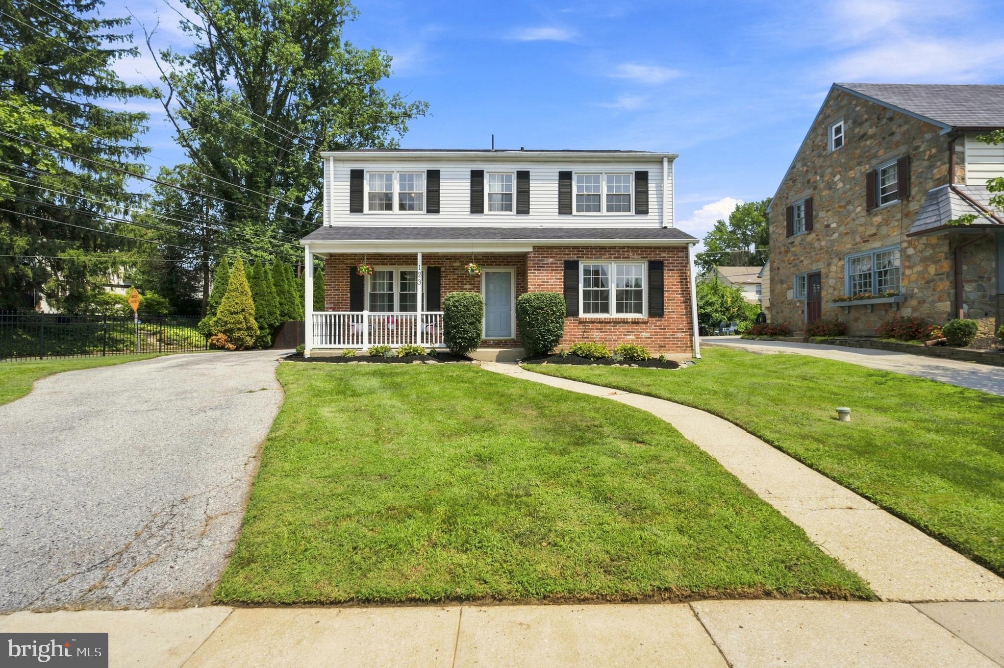 Here is your opportunity to own a beautiful home in Lower Merion Township with a centralized walk-to location that is completely move-in ready, loved and clean as a whistle!  This freshly updated center hall Colonial sits on a large corner lot with a large private driveway, large fully fenced backyard and offers clean lines and a modern aesthetic throughout.  Pull up and fall in love with the classic curb appeal.  The perfect little front porch to have your morning coffee and fresh landscaping frame the home.  The first floor offers a phenomenal circular floor plan to include a center hall foyer, stunning  and large living room that flows right into the den space with fireplace and sliders that lead out to the backyard and pavers patio.  The open kitchen has been renovated to include cherry cabinets, granite countertops, tile backsplash and flooring and a door out to the large private driveway.  There is a perfectly sized breakfast nook adjacent to the kitchen as well as a large and bright formal dining room.  The powder room is perfectly tucked off the den.  The flow of the first floor is more open than many of the homes on this popular street.  Gleaming oak hardwoods with the exception of the kitchen really unifies each room to the next and gives you an easy foundation for your decor.  Upstairs on the 2nd floor you’ll find 4 bedrooms, all with nice closet space including a primary bedroom with a full bath, a fresh hall bath and so much natural light at all angles.  The lower level of the home is partially finished and a nice clean space for whatever your needs are!  Enjoy the larger rec room space with new vinyl flooring as well as another room that is currently being used as a 5th bedroom but could be the perfect office or guest room space.  The utilities and laundry are separated for convenience.  This classic Colonial offers a truly move-in ready aesthetic!  The current owner is meticulous and the home shows so well.  You walk in and instantly feel happy with all of the front to back natural light that pours in the home.  Walk to schools, parks, Wynnewood Attractions, the shops along Manoa rd as well as Havertown attractions such as Brookline Blvd in minutes.  This home is very special and a wonderful value!