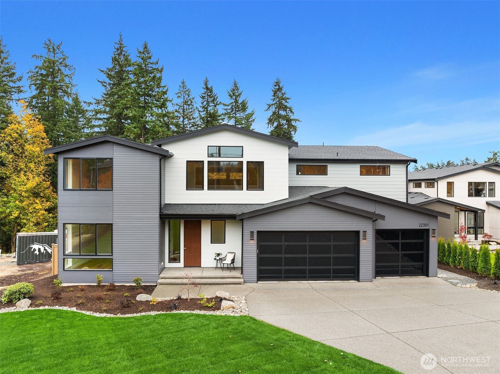 Phillips Ridge Phase 2 New Northwest Contemporary Luxury Homes on 1/4 Acre+ Homesites. OLYMPIC 3910: Covered porch, grand vaulted entry, main floor den, guest suite & 3/4 bath. Stunning two story great room with floor to ceiling ceramic tile fireplace, & covered outdoor living area. Full open rail custom staircase with hardwood staircase. Gourmet kitchen has high-end stainless steel appliances, grand quartz waterfall island, coffee bar & walk-in butlers pantry with second under mount sink. Primary suite boasts a freestanding soaking tub, frameless glass shower and heated floors. Includes an open bonus room, 4th bedroom w/ attached bath & large flat fenced backyard. Hot water recirculation system, A/C, heat pump. 17,410 sf greenbelt homesite