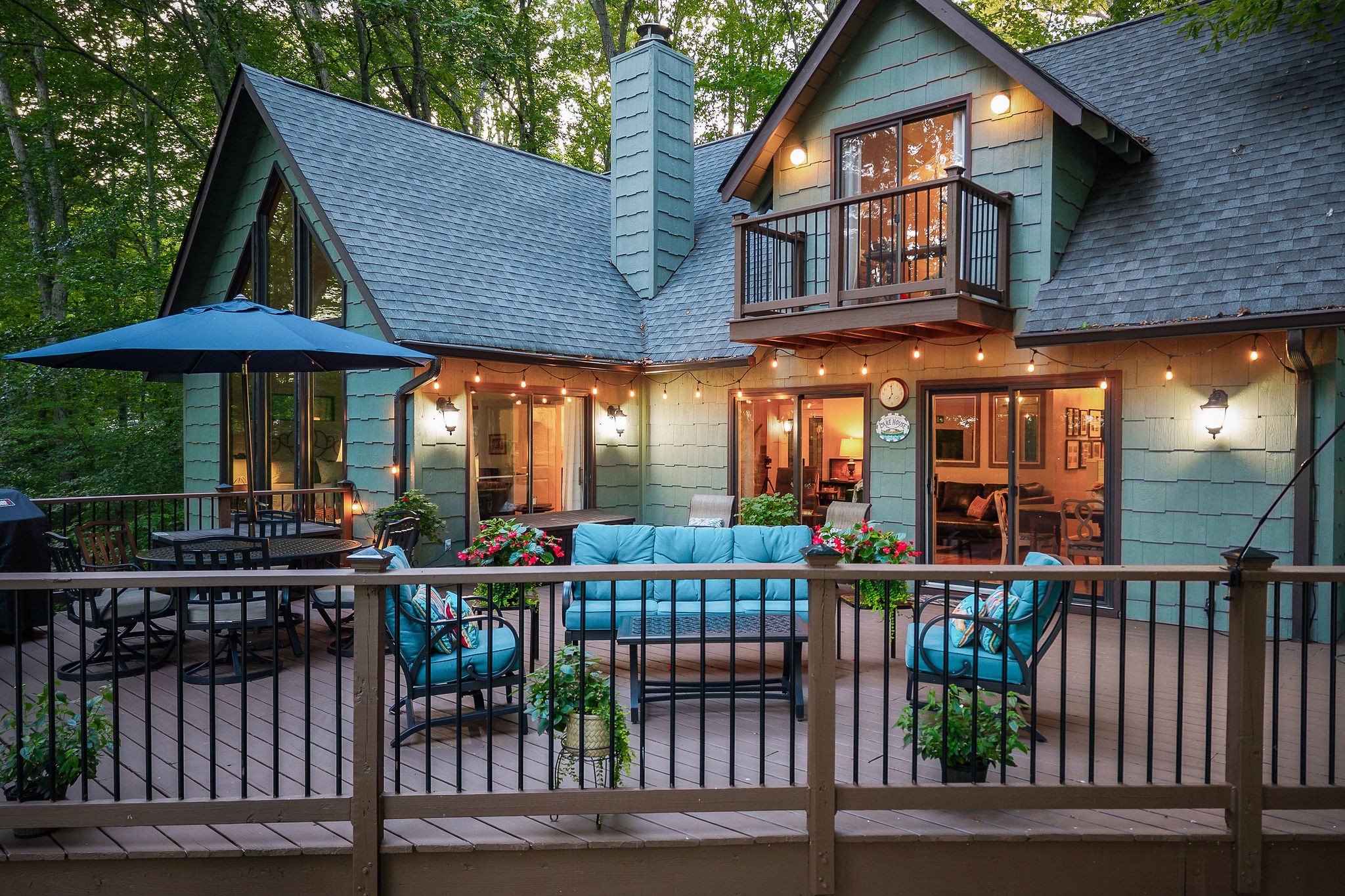 Escape to Center Hill Lake with this stunning 3-bedroom, 3-bath lake-view retreat - plus two additional rooms currently used as bedrooms - in the highly sought-after, gated Four Seasons community. Perfectly positioned just 3 minutes from Four Seasons Marina, this beautifully appointed home blends privacy, comfort, and access to top-tier amenities including a community pool, tennis courts, playground, and more. Set on three parcels in a tranquil, park-like setting, the home features spacious open-concept living areas, inviting guest rooms, and a sumptuous primary suite with a cozy fireplace. A private upstairs recreation level - with its own bedroom and full bath - creates ideal space for guests, entertaining, or relaxing. Outside, a beautifully designed detached garage offers exceptional functionality for lake living, featuring two bays with one 8-ft door and one 10-ft door - perfect for storing a boat, lake toys, or larger vehicles. Whether you’re hosting friends, enjoying quiet evenings on the deck, or heading to the marina, this property delivers the ultimate Center Hill Lake experience. Don’t miss this rare opportunity to own a premier lake-view home in one of the lake’s most desirable communities.