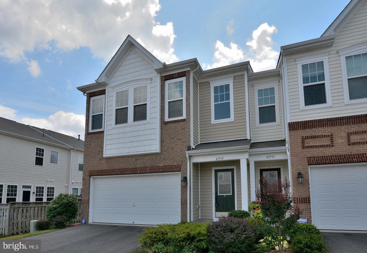 **Welcome to this stunning Northeast-facing End Unit Villa in the highly sought-after Stone Ridge community, offering over 2,531 square feet of beautifully designed living space with 4 spacious bedrooms and 3 full bathrooms. **Thoughtfully designed for comfort and flexibility, this exceptional home features a **rare main-level oversized bedroom with an adjacent JACK-N-JILL full bath**, ideal for guests, multigenerational living, or a private home office.A charming, highly private front porch creates the perfect space to relax and enjoy every season. Inside, you'll be greeted by an open and airy floor plan enhanced by **engineered hardwood flooring throughout the entire main level**. The gourmet kitchen is a chef's delight, showcasing granite countertops, upgraded latest stainless steel appliances, contemporary cabinetry, and a spacious walk-in pantry.The inviting family room opens to a private patio and fenced outdoor space, perfect for entertaining or unwinding. The elegant living and dining areas provide ample room for gatherings and everyday living.Upstairs, the luxurious owner's suite offers a generous bedroom, an expansive walk-in closet, and a spa-inspired bath featuring dual vanities, and a large walk-in shower. Two additional spacious bedrooms share a convenient Jack-and-Jill bathroom, creating an ideal layout for family and guests.The location is truly exceptional:* Less than 0.2 miles from a clubhouse and swimming pool* Access to **3 clubhouses, 3 community pools, a fitness center, scenic trails, and playgrounds*** Approximately 1 minute to Park & Ride* About 10 minutes to the Metro and airport* Minutes to shopping, restaurants, hospitals, banks, and everyday conveniences* Close proximity to the vibrant Brambleton Town CenterEnjoy resort-style amenities, outstanding convenience, and low-maintenance living in one of the area's most desirable communities. This exceptional home truly offers the perfect blend of luxury, comfort, and location.
