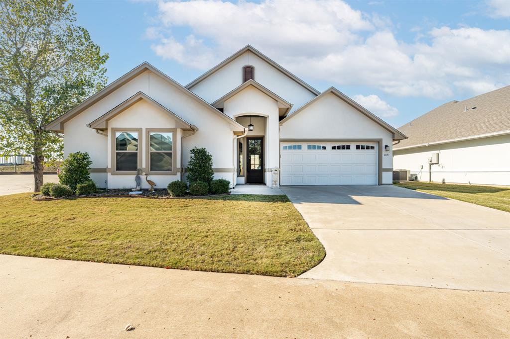 Easy living on Easy Street! Immaculately maintained one-owner home in gated 55+ community. HOA dues of $110 per month include full yard maintenance. This three bedroom home includes wide hallways and doors for those who may need wheelchair or walker accessibility. The kitchen features a large island, pantry, and is open to the living and dining room. Beautiful finishes throughout including granite countertops, stainless steel appliances, Delta hardware, and luxury vinyl plank flooring. Fridge, washer and dryer to convey. Great master suite with ensuite bathroom, large walk-in closet, and easy access to the utility room. The guest bedrooms are spacious and separate from the master allowing for nice privacy. The upstairs bonus room has its own mini-split HVAC unit that can be turned off when the room is not in use but allows for great storage or extra living space when needed. Built in 2021, this home features fantastic energy efficiency with spray-foamed insulation. Come enjoy low energy bills and low maintenance with this perfect retirement home in beautiful Glen Rose.