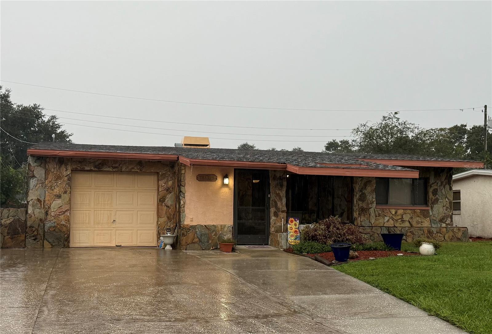 MOTIVATED SELLER! Bring your offers! Welcome to this spacious and versatile 2-bedroom, 2.5-bath NO HOA home in Largo. Originally configured as a 3-bedroom, 2-bath home, this property offers the potential to convert back to its original layout, providing an additional bedroom and increased functionality. Screened in front porch and back patio with an outdoor kitchen and half bath. With approximately 1,397 square feet of living space and a 6,599-square-foot lot, this home offers plenty of opportunity to customize the space to fit your needs! Conveniently located in Largo with easy access to shopping, dining, and LESS THAN 5 MILES FROM THE BEACH! Buyer and buyers agent to verify all information.