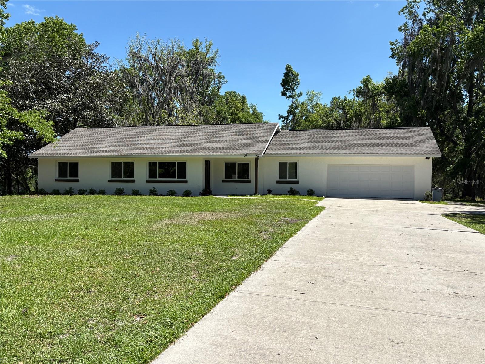 3-Bed, 2-Bath Home with Barn on 10 Acres in Ocala
This beautifully updated home sits on 10 fully fenced, gently rolling acres in Ocala—ideal for horses or agricultural use. The property features a large barn, multiple cross-fenced pastures, a gated driveway, and a four-board fenced front yard adding charm and security.
Inside, the open-concept layout offers new luxury flooring, a custom kitchen with granite countertops, and stainless-steel appliances including a range, refrigerator, dishwasher, and microwave. Additional highlights include new windows throughout, elegantly tiled bathrooms, and a new washer and dryer.
Recent upgrades include a new roof, air conditioning system, hot water heater, new septic tank and drain field.
Just 20 minutes from the World Equestrian Center, with shopping and dining nearby, this move-in-ready home offers modern comfort and peaceful country living.
Bonus: Purchase adjacent parcel MLS# O6305053 to expand your estate to 40 beautiful acres.