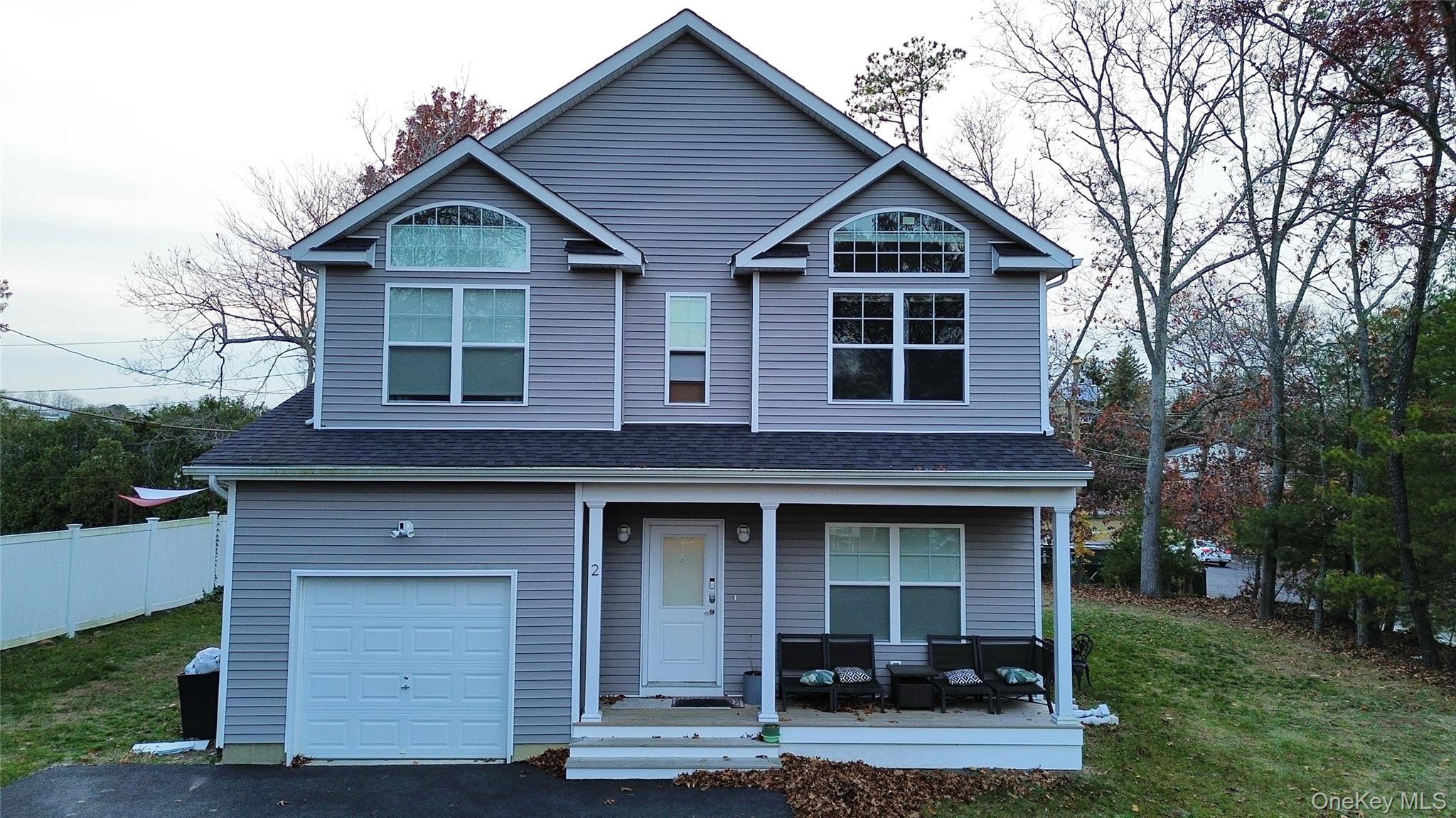 Welcome to 2 Winfield Davis Dr in Coram, NY. This stunning 2022-built home sits on 0.34 acres in a desirable location and offers modern comfort, space, and energy-efficient living. Featuring 4 bedrooms, 2.5 bathrooms, and a 1-car attached garage, this property is designed for both convenience and style. Step inside to a bright and open living room and a beautiful, spacious kitchen complete with granite countertops, a center island, and plenty of cabinetry for storage. The home is equipped with central air, and each bedroom features large windows that allow for an abundance of natural light.
This property also includes solar panels, adding valuable energy efficiency to the home. Additional highlights include a first-floor washer and dryer and a backyard shed for extra storage.