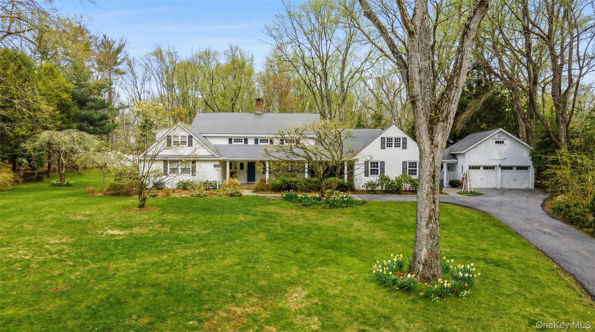A rare and enchanting converted church, reimagined as a beautiful country home set on two private acres in the heart of Pound Ridge. Originally a small chapel where the local community once gathered, the home still retains elements of its early history, including soaring ceilings in the original sanctuary space that create a striking sense of volume and light. In the 1950's, the structure was thoughtfully expanded and transformed into an inviting residence with magnificent antique floorboards throughout that add timeless character and charm. A beautiful sunroom overlooking the back gardens offers a perfect place to relax and take in the peaceful surroundings year round.The grounds are truly magical with mature landscaping and plantings, inviting stone patio, and a stunning pergola draped in wisteria, ideal for outdoor entertaining or quiet afternoons. A heated saltwater pool, surrounded by elegant white fencing enhances the serene setting.Privately gated and set far back from a quiet cup-de-sac road, this exceptional property offers privacy, beauty and a truly special sense of peace!