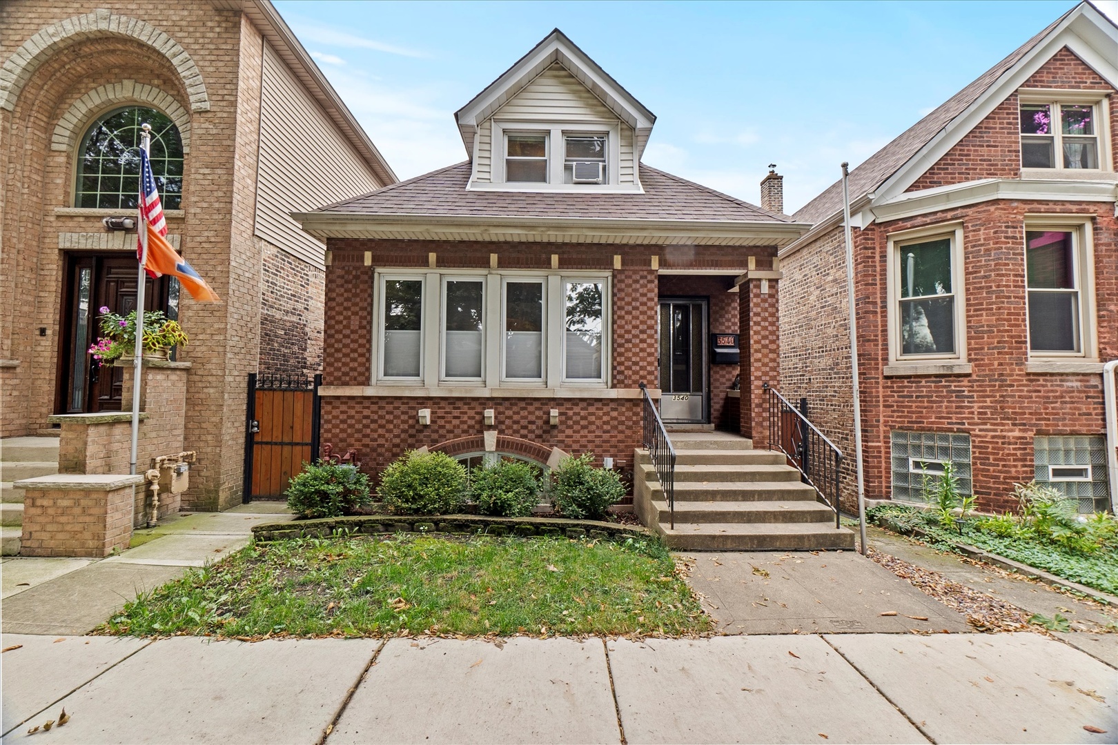 Rarely Available All-Brick Bungalow Just One Block from McKinley Park!  Step into this beautifully updated home featuring an open concept living, dining, and kitchen area with hardwood floors throughout. The designer kitchen boasts quartz countertops, extra-large farmhouse sink, stainless steel appliances, and stylish floating shelves. The main level also includes a bedroom, full bathroom, a walk-in pantry, and an office-ideal for remote work or study. Upstairs has been completely renovated, offering two spacious bedrooms, another full bathroom, and a cozy sitting room with hardwood flooring throughout. The finished basement provides abundant storage, a generously sized laundry room, and a comfortable family room perfect for entertaining. Enjoy the outdoors with a brand-new deck, brick paver patio, screened-in sunroom, and a two-car garage. Located just steps from the park, public transit, popular restaurants, and shopping-this is the one you've been waiting for! Multiple offers received.
