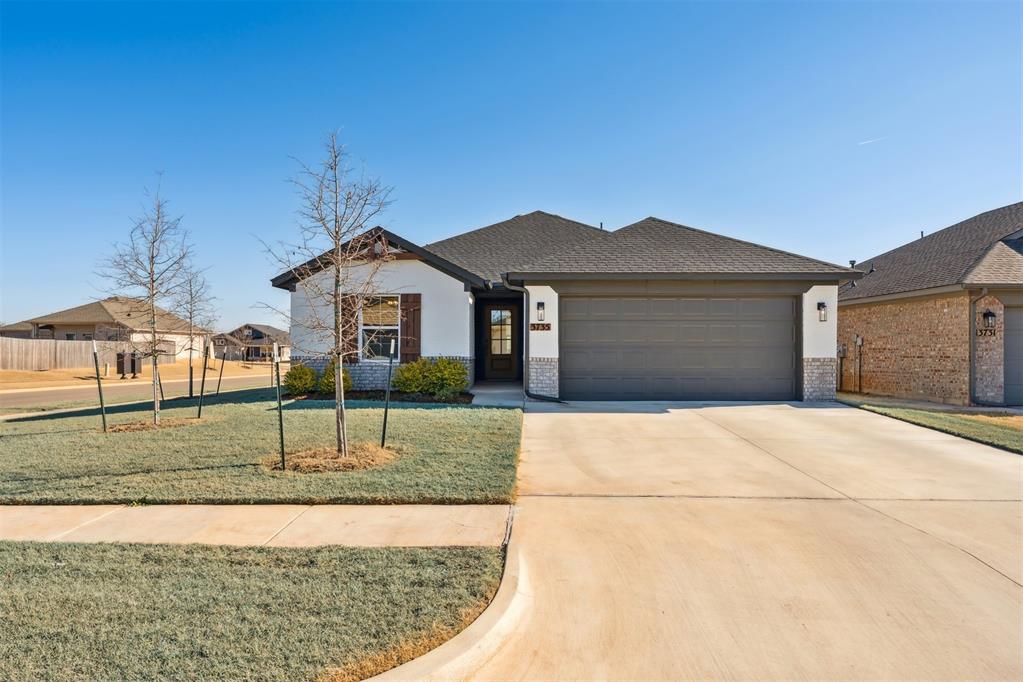 Welcome to 3735 Cassidy Dr — a beautifully upgraded home situated on a desirable corner lot in the Flint Hills community of Norman. This thoughtfully designed 3 bed/2 bath home offers an open-concept layout that’s perfect for both everyday living and entertaining.The spacious kitchen is a true centerpiece, featuring an oversized island ideal for prep and gatherings, upgraded countertops, a gas range, a Blanco composite sink, and striking brass-gold fixtures that add a modern, elevated touch. Durable hard-surface flooring flows seamlessly through the main living areas, creating a clean and cohesive feel. The living space opens to a covered patio, providing the perfect spot for outdoor relaxation.Just off the kitchen, you’ll find a cozy and functional laundry room that conveniently connects to the garage — ideal for daily routines. This space includes a pantry with deep shelving, offering excellent storage for groceries, appliances, and household essentials.Ceiling fans are installed in every bedroom for year-round comfort. The primary suite offers a generous walk-in closet, while the primary bathroom features a quartz vanity and a beautifully tiled shower.Additional highlights include window blinds throughout, a Ring doorbell, wrapped guttering, and a larger garage designed to accommodate longer vehicles with extra storage space. This corner lot has upgraded landscaping, with a treated yard that enhances curb appeal and usability.Flint Hills homeowners enjoy quick access to Tecumseh Road, making travel across Norman easy and efficient. I-35 is just minutes away, the University of Oklahoma is approximately 10 minutes, and Tinker Air Force Base is under a 20-minute drive. Community amenities include fishing ponds, walking trails, a playground, a splash pad, and a soccer field — offering something for everyone to enjoy!