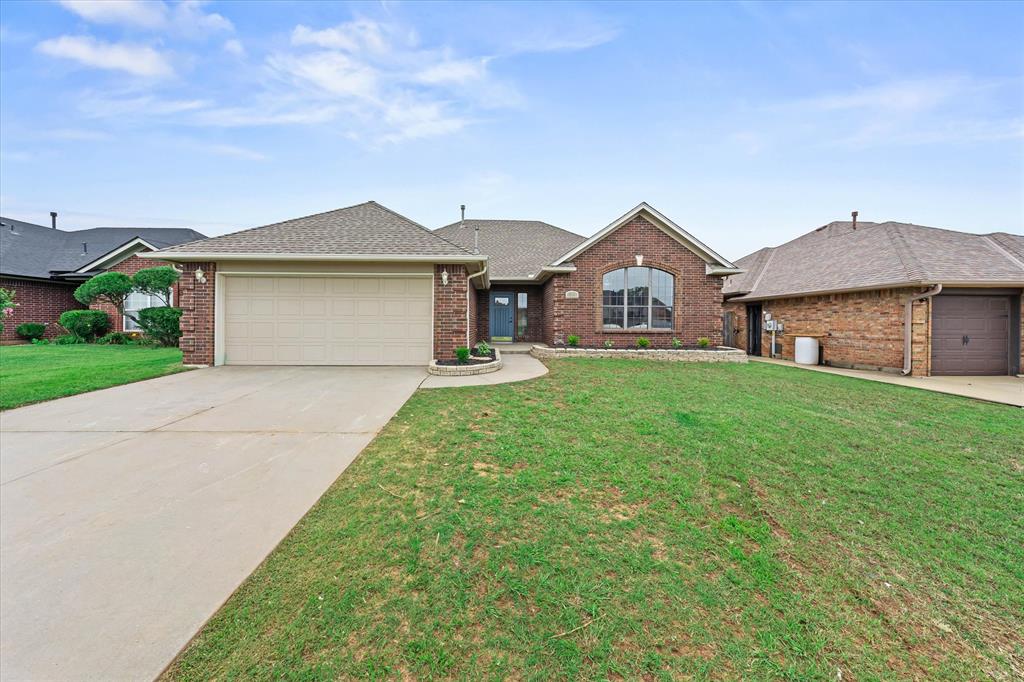 Step inside to a home where timeless design meets modern updates. From the soaring ceilings and oversized windows to the inviting brick fireplace and thoughtfully refreshed finishes, this Northpark home offers the perfect blend of warmth, style, and functionality. Natural light pours into the open living spaces, creating an inviting atmosphere that’s equally suited for everyday living and effortless entertaining. Every room has been thoughtfully refreshed while preserving the home’s character and spacious feel, making it truly move-in ready. Offering 3 bedrooms and 2 bathrooms, this beautifully updated home features fresh interior paint, new carpet, updated countertops, and stylish light fixtures throughout. The spacious kitchen provides ample cabinet and counter space with a center island that opens seamlessly to the main living area. The private primary suite serves as a true retreat with an elegant tray ceiling and a spacious ensuite bathroom complete with dual vanities, a relaxing soaking tub, separate walk-in shower, and a generous walk-in closet. Two additional bedrooms provide flexibility for guests, a home office, or growing families. Conveniently located in the highly sought-after Northpark addition of Moore, you’ll enjoy easy access to shopping, dining, schools, and major highways. This beautifully renovated home is ready to welcome its next owner.