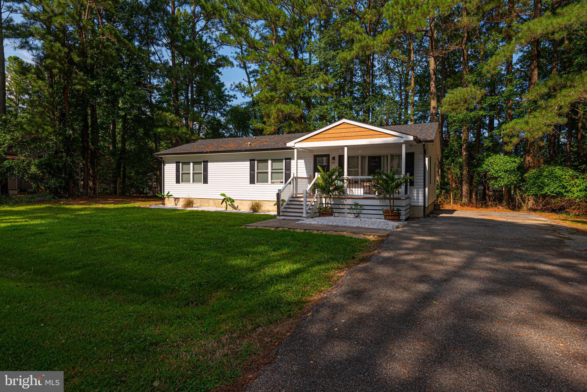 Don't miss out on this incredible opportunity to own a piece of Ocean Pines paradise. With its unbeatable location, stunning design, and endless possibilities, this remodeled 4 bedroom, 2 bath home is the perfect haven for anyone looking to experience the best of coastal living. This home has a new architectural roof, new siding and shutters, high efficiency tilt in windows, new flooring throughout, vanities and a beautiful gourmet kitchen with a large granite breakfast bar that seats 6. One of the larger lots in the Pines with the home situated to easily add a two-car garage. South gate living at its best and just a few houses over from the bay. Schedule a showing today and make your dreams a reality!