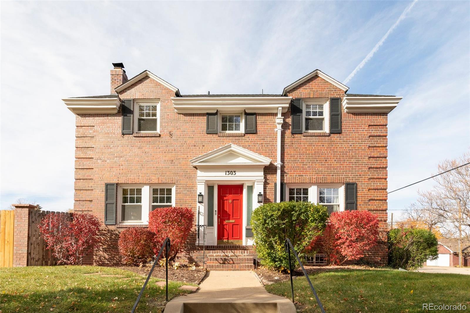 Perched on an oversized (10,500sf) corner lot overlooking the southwest edge of Washington Park, this rare Colonial Revival home represents a once-in-a-generation opportunity to own one of Denver's most coveted addresses. Elevated above street level, the property creates an urban oasis where park views meet remarkable tranquility.Every detail of this home reflects the vision of renowned designers Pratt and Deutsch, who orchestrated an extensive whole-home renovation that honors the home's historic character while delivering modern luxury. Custom lighting illuminates open shelving in both the kitchen and bar, creating gallery-like focal points that blend functionality with artistry.The kitchen anchors the home with thoughtfully integrated Fisher & Paykel appliances—a paneled refrigerator and dual-drawer dishwasher maintain clean sightlines, while the 36-inch stainless gas range commands attention. Flowing seamlessly into living and bar areas, the space is designed for both daily life and sophisticated entertaining.The primary suite offers a private retreat with generous walk-in closet and a spa-inspired bath featuring heated floors, a soaking tub with heating function, dual vanity, and custom shower—all bathed in western light.The rare 10,500 square foot lot provides space that's nearly impossible to find this close to the park—and it's been transformed into a private sanctuary. A custom-built cedar spa hot tub by local artisan Cedarwood Spas LTD anchors the outdoor living space, offering a therapeutic retreat crafted from premium western red cedar with meticulous attention to detail and functionality. This isn't a mass-produced hot tub—it's a bespoke wellness amenity that elevates the entire property.A detached 2-car garage plus attached 1-car garage offer flexibility for vehicles, storage, or workshop space.Walk out your door to Washington Park's 165 acres. This is Denver at its finest.