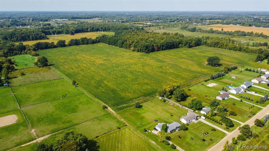 Great agricultural property to build dream home or develop.  Approx 16 acres are wooded.  Property is to be split from parent parcel and sale is subject to township approval.  Seller has blue prints available for previous proposed site condo development.