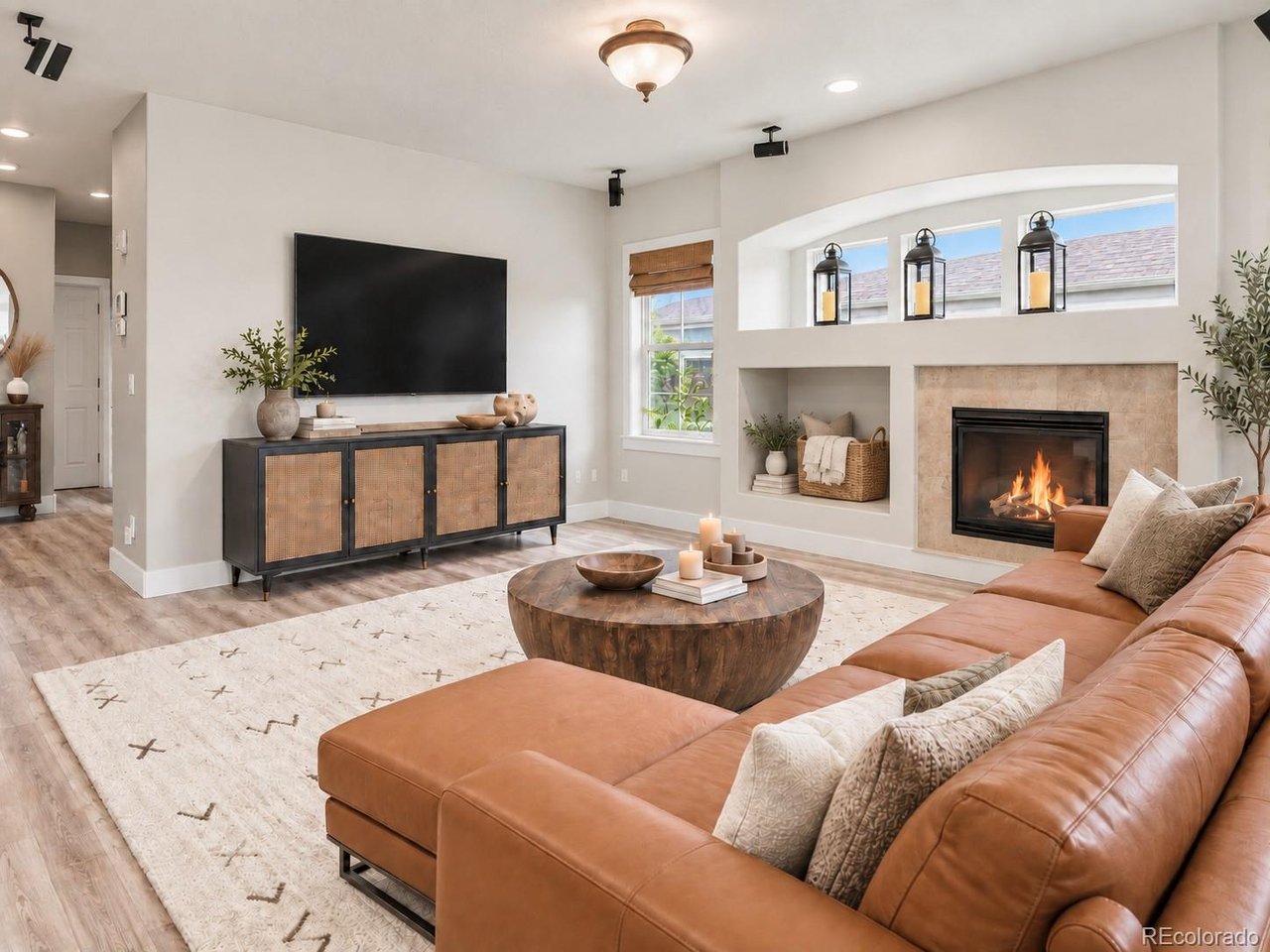 *** ASK ABOUT OUR PREFERRED LENDER INCENTIVE UP TO $7K FOR CLOSING COSTS OR A 1/0 BUYDOWN** Welcome to 1418 Falcon Place, where generous living spaces, mountain views and the Colorado lifestyle come together in Erie's sought-after Vista Ridge community. From the moment you step inside, soaring vaulted ceilings, hardwood floors and abundant natural light create a bright and inviting first impression. Designed with both everyday living and entertaining in mind, the main level offers a spacious kitchen with an oversized island, abundant counter space, stainless steel appliances and a gas cooktop, opening seamlessly to the family room anchored by a cozy fireplace. A formal living room, dining room, dedicated home office that could function as a 5th bedroom, powder bath and convenient laundry room with utility sink complete the main level. Upstairs, the spacious primary suite feels like a true retreat, featuring mountain views, five-piece bath and two closets. Two additional bedrooms and a generous loft provide plenty of flexibility for a second office, playroom, media space or lounge. The finished basement adds an entirely new level of living and entertaining space with a second fireplace, wet bar, recreation and game areas, plus an additional bedroom and bathroom-ideal for guests or extended stays. Outside, unwind on the back deck and take in Colorado's beautiful moutain views skies and sunsets. An attached three-car garage provides ample room for vehicles, gear and additional storage. Set within the established Vista Ridge community, residents enjoy access to neighborhood amenities, parks and trails, all centered around Colorado National Golf Club. With multiple indoor and outdoor living spaces, mountain views and a floor plan designed to flex with the way you live, 1418 Falcon Place offers the space, setting and lifestyle that make Vista Ridge such a special place to call home.