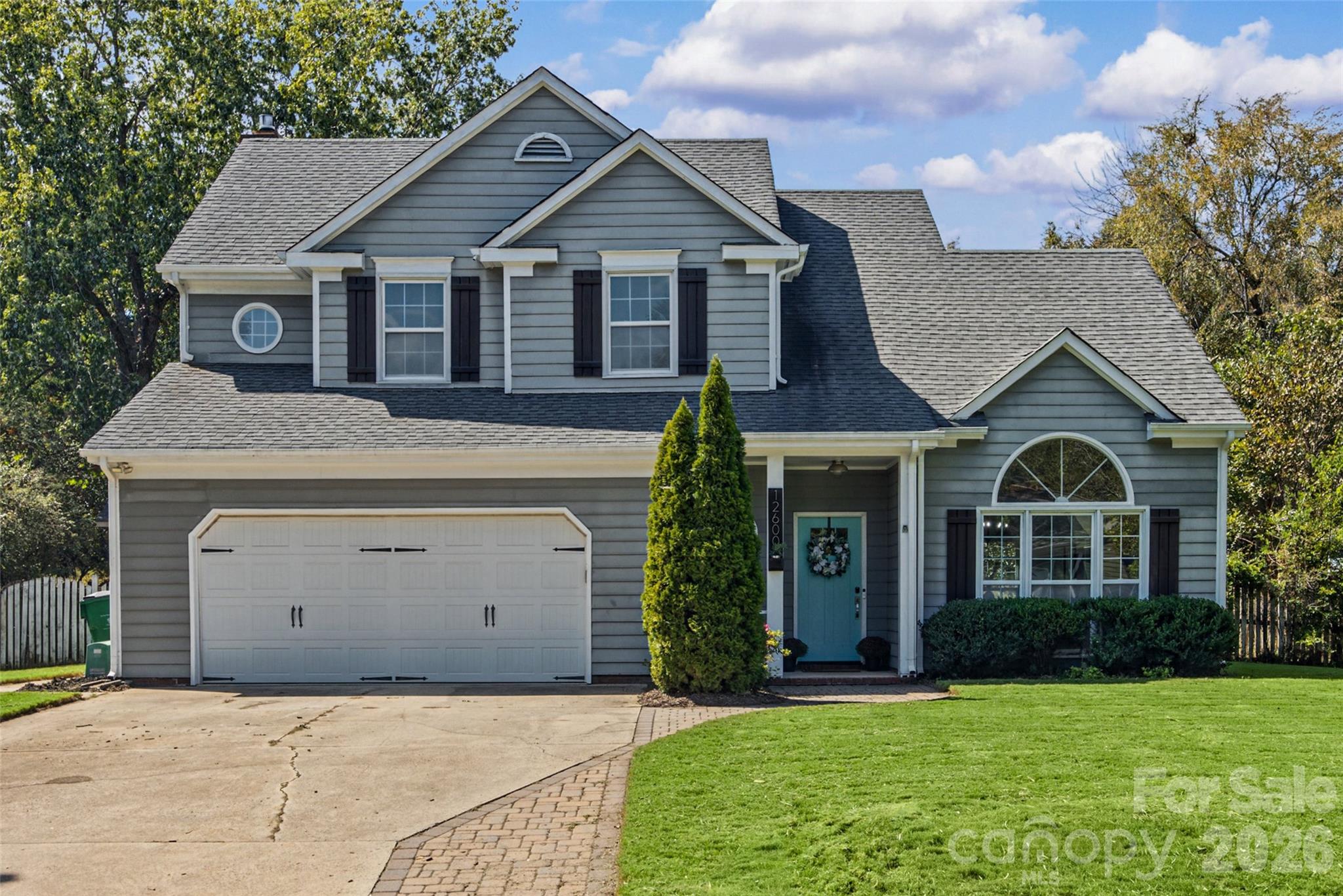 Welcome to 12600 Parks Farm Lane in the beautiful Raeburn neighborhood! This freshly updated 3-bedroom, 2.5-bath home combines a sought-after Blakeney/Ballantyne location, excellent area schools, and easy access to Blakeney’s shopping, dining, and everyday conveniences. Set on a spacious lot, the home offers inviting outdoor living with a screened back porch and a paver stone patio with a firepit—perfect for relaxing or entertaining. Inside, the recently updated kitchen features quartz countertops, stainless steel appliances, and a new microwave. Fresh paint throughout entire home, all-new carpet on the stairs and second level  create a bright, welcoming feel. A refreshed powder room with a new vanity, lighting, and mirror adds a stylish finishing touch. Thoughtfully positioned for today's market, this home offers an appealing opportunity for buyers seeking value in the area.  Fresh updates, great location & schools!  Come discover the charm of Raeburn and the convenience of this fantastic South Charlotte location!  Open House scheduled for Saturday, October 10, 2026 from 1-3!  Come visit and see for yourself!