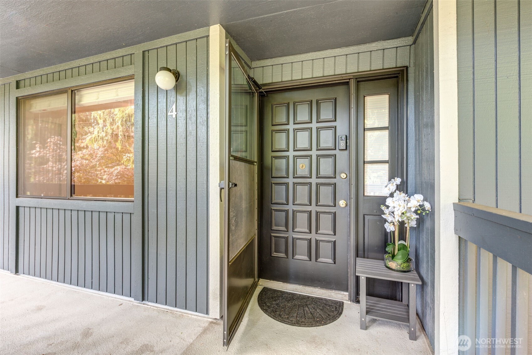 This quiet end unit offers rare privacy with only one shared wall. It is the last building in the complex providing peaceful setting yet close to transit , shopping, restaurants and Edmonds CC. Beautifully  remodeled throughout: newer kitchen cabinets, stylish tile backsplash, quartz countertops and SS appliances . Durable vinyl plank flooring , updated bathrooms , fresh paint and cozy fireplace with tile surround. Enjoy your private deck overlooking the courtyard in a well- maintained community.