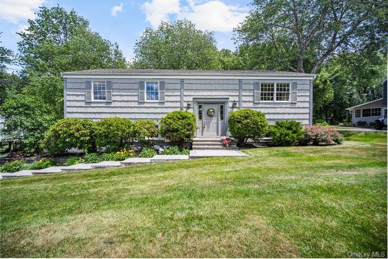 Welcome to this recently renovated, ready to move right in 4 bedrooms, 3 full bathrooms home.  The oversized kitchen has a new stove and lots of cabinet space.  There is hardwood flooring throughout. The living room leads to a large deck overlooking private woods. The upstairs has a primary suite with bath plus 2 additional bedrooms with a hall bathroom.  The lower level is fully finished with a walk out covered porch so you can enjoy your yard in any weather.  There is also a 4th bedroom and full bath in the lower level.  The back yard is a quiet, private, peaceful sanctuary.  The yard is ideal for outdoor parties or just relaxing and ideal for making lasting memories.