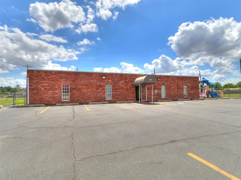 Former day care center built in 1988. Building could be adapted for multiple uses. Mag locks with multiple keys; new roof and new AC units 2014/2015; new floor and baseboards 2024; LED light conversion; safe room; Plumbing upgrade with drain cleanout 2023; electrical panels replaced with new bussbars and breakers; updated NEST thermostats for 4 zones and units. New oven and dishwasher, 2025; New awning, 2025; Parking lot resealed every other year. (Newest reseal 1.5 years ago); Fresh paint throughout; Professionally maintained heat/AC systems. 20 cameras and monitored security and fire alarm systems.