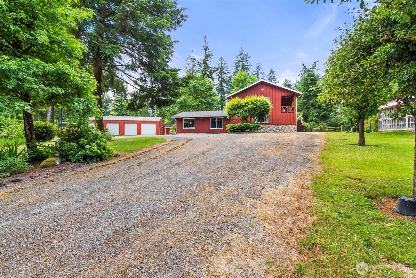 Country living meets modern convenience!Situated on a private dead-end street, this picturesque 2.6- acre property offers a peaceful retreat surrounded by mature trees and thoughtfully designed outdoor spaces. The fully fenced acreage features multiple garden spaces, a fenced pasture, and several outbuildings for storage, hobbies, or homesteading endeavors. A spacious shop provides abundant room for equipment, recreational vehicles, and projects of every kind. Inside, this home offers 3 bedrooms plus a bonus room and 2 bathrooms. Hardwood floors and exposed beam add warmth and character, while the cozy fireplace creates the perfect setting for Pacific Northwest evenings. Enjoy the flexibility of two generous living spaces and a large kitchen designed for gathering, entertaining, and everyday living. Thoughtful updates throughout blend modern comforts with timeless country charm. The finished daylight basement expands the living space and features a pellet stove with direct access to the patio- ideal for entertaining guests or simply enjoying the tranquil surroundings. Conveniently located just 15 mintues from the freeway and within easy reach of JBLM, this property combines rural serenity with everyday convenience. A rare opportunity to enjoy privacy, space, and the lifestyle you've been dreaming of.