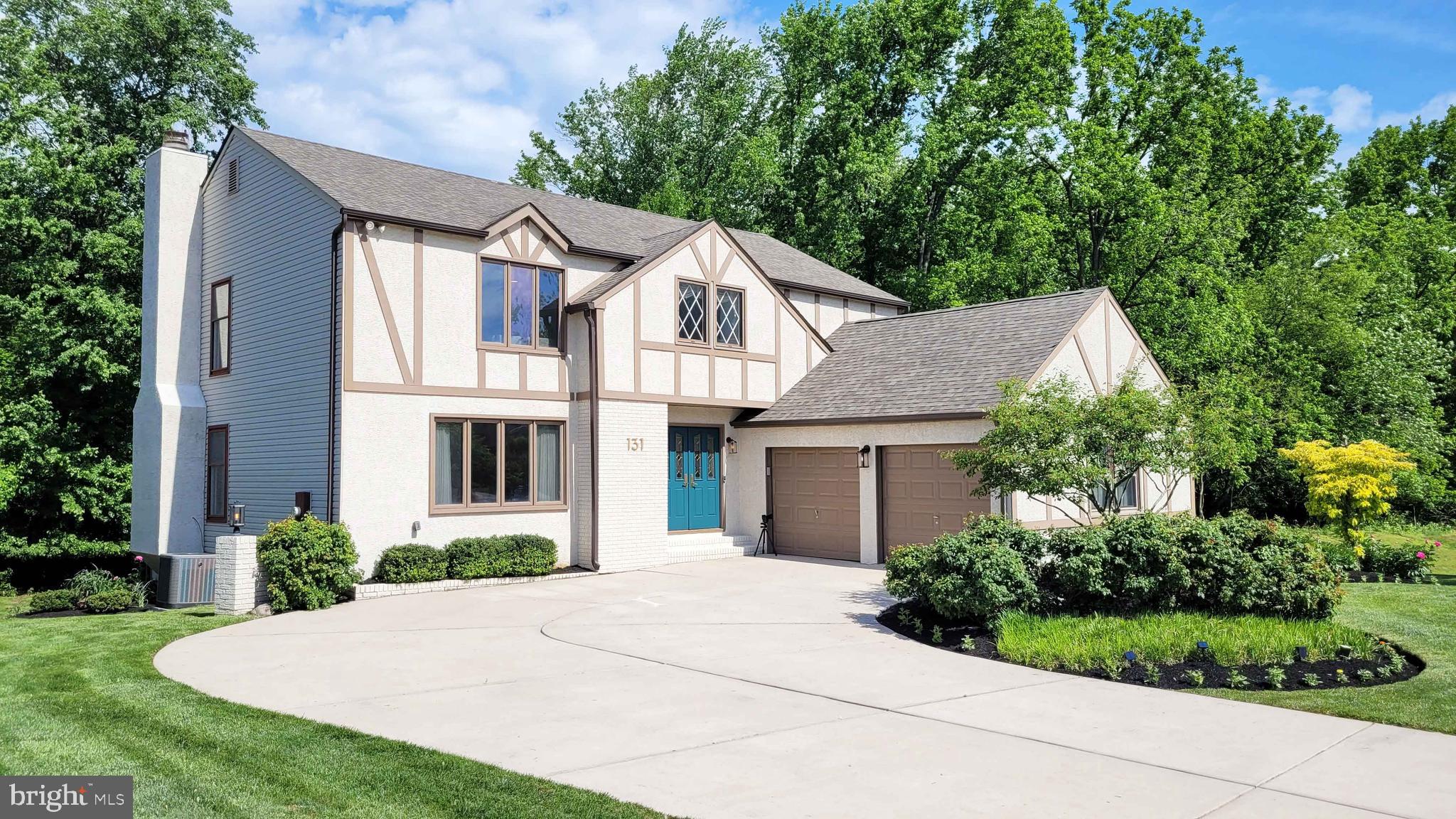 Exceptional curb appeal delivers striking first impressions! Majestically perched on a premium 0.24 acre manicured lot.  Experience the rare luxury of a protected sense of privacy that makes your back & side yards feel like a vast, personal park.  This eye-catching Tudor-style home blends timeless character with modern comfort, featuring a spacious and functional layout ideal for today’s lifestyle. Highlights include: dramatic volume ceiling, center-hall entry; large center-island kitchen with ample cabinetry, pull-out drawers and a convenient pantry,  seamlessly opening to the family room with a gas-log fireplace; recessed lighting throughout and rich new Birchwood floors on the living & bedroom levels;  Grand staircase ascends to an open concept loft, suggesting a perfect work-from-home setup; generous primary bedroom suite with adjoining luxury bath that includes double sinks, separate shower stall and soaking tub; Super-roomy secondary bedrooms ensure comfort for all.  The finished basement provides additional HVAC serviced living space, 1,034 S/F recreation room in addition to a bonus room, storage room and the laundry room.  Enjoy outdoor living on the 16 x 20 elevated Trex deck with metal railings, all set against natures finest peaceful perimeter of privacy. Note: Roof (4 yrs), Coil & Condenser (2yrs)