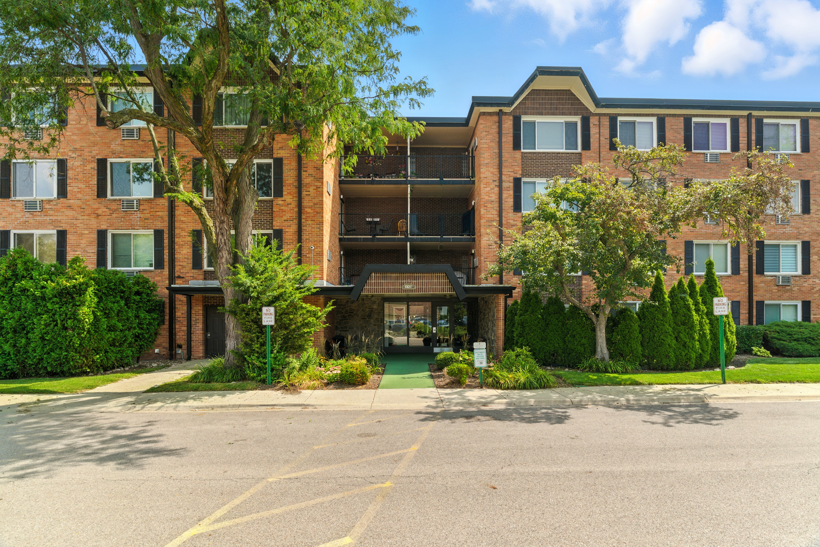 Welcome to resort-style living in this beautifully maintained 1-bedroom, 1-bath condo nestled in a highly sought-after community! Step inside to brand new plush carpeting and easy-care vinyl flooring in the kitchen. Enjoy the convenience of a private 1-car detached garage, pass-through kitchen window, and a spacious layout featuring a separate living and dining room. This elevator building offers unmatched amenities including a bike storage room, coin-operated laundry, and convenient trash chute in the main hallway. You'll love the extra-large storage space with a designated cage-perfect for seasonal items. Set on award-winning 32-acre landscaped grounds, the community features 2 heated swimming pools, outdoor jacuzzi, fitness center, tennis/pickleball courts, volleyball and picnic areas, scenic jogging and bike paths, and a stunning lakeside pavilion for multi-purpose use. Located directly across from Arlington Lakes Golf Club and centrally located near I-90, Route 53, and Northwest Highway for an easy commute. This is affordable luxury living with every convenience and amenity at your doorstep-don't miss out! (Note on Assessment: Condo is 361.22/month and the Garage is 71.37 a month) Primary residence only - no rentals allowed.