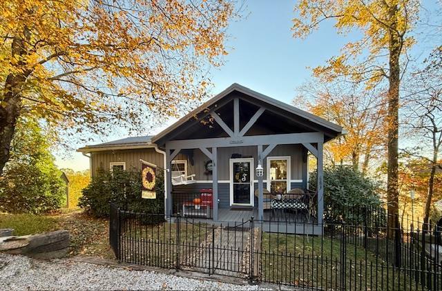 Breathtaking VIEWS from this well appointed cottage at Cascade Mtn Resort.  60+ mile views looking toward NC, with day and night views.  This home is TOTALLY furnished, EVERYTHING, decor, etc........move in ready!  The home has custom cabinets, granite, a real rocked masonry fireplace(with gas logs), exposed beams, a massive covered porch with stunning views of the piedmont region of NC.  This is a 2br, 2ba, but can accommodate sleeping for 8.  Lots of storage, very little maintenance, words really cannot describe how stunning this property is!  Cascade offers, a new swimming pool, tennis courts, Gated community.  You will NOT be disappointed , this property checks ALL the boxes and meticulously maintained!
