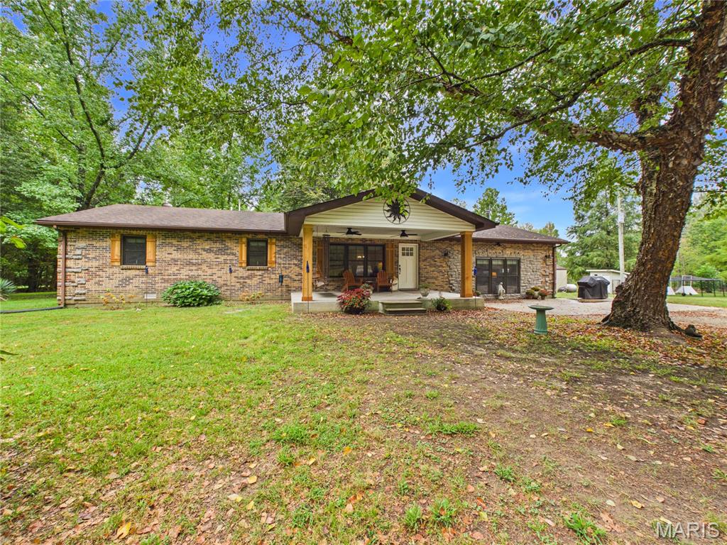 Looking for room to breathe? This beautifully remodeled ranch sits on almost 26 acres that border conservation land, giving you the peace of a private retreat. A thoughtful mix of open yard with beautiful well placed trees, working pasture, and mature woods means there's space for everything — gardens, animals, hunting, or just wandering your own backyard.Inside, the home has been completely remodeled and feels like new. The 3-bedroom, 1.75-bath layout is comfortable and easy to live in. The den is the heart of the home — a warm, inviting space anchored by a brand-new wood burning stove, perfect for cozy nights after a day spent outdoors. For peace of mind, a large family storm shelter/safe room is built right in, offering serious protection without sacrificing livability.Outside, the property keeps delivering: a spring-fed pond adds beauty and function, and a shop provides the workspace or storage every acreage owner wants. Whether you're dreaming of hobby farming, horses, a hunting retreat, or simply space between neighbors, this property checks the boxes. The endless list of all the upgrades and updates won't go unrecognized at this place, schedule a showing today to come see for yourself!Modest in footprint, big in lifestyle — this is one of those rare offerings where the land is just as impressive as the home. The endless list of all the upgrades and updates won't go unrecognized at this place, schedule a showing today to come see for yourself!