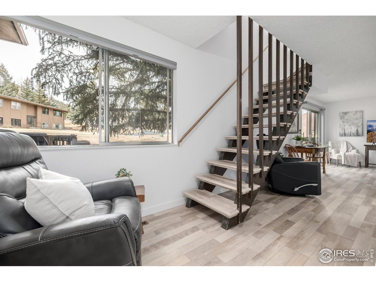 Beautifully updated condo in the desirable Fairway Club community of Estes Park! Perfectly positioned right on the 18-hole golf course, this light and bright unit offers stunning mountain and fairway views in a quiet, well-maintained neighborhood just minutes from downtown Estes Park and the entrance to Rocky Mountain National Park.Enjoy an open-concept living area with a cozy fireplace, spacious dining area, and well-appointed kitchen ideal for entertaining. This unit features two private balconies, perfect for morning coffee or evening relaxation while taking in the peaceful golf course setting and fresh mountain air.The primary suite provides a tranquil retreat, while additional bedroom space offers flexibility for guests or a home office. Added conveniences include one covered carport space plus one reserved parking spot. Whether you're seeking a full-time residence, mountain getaway, or investment opportunity, this low-maintenance condo delivers comfort, views, and classic Colorado charm. Close to golf, hiking, wildlife viewing, and all that Estes Park has to offer
