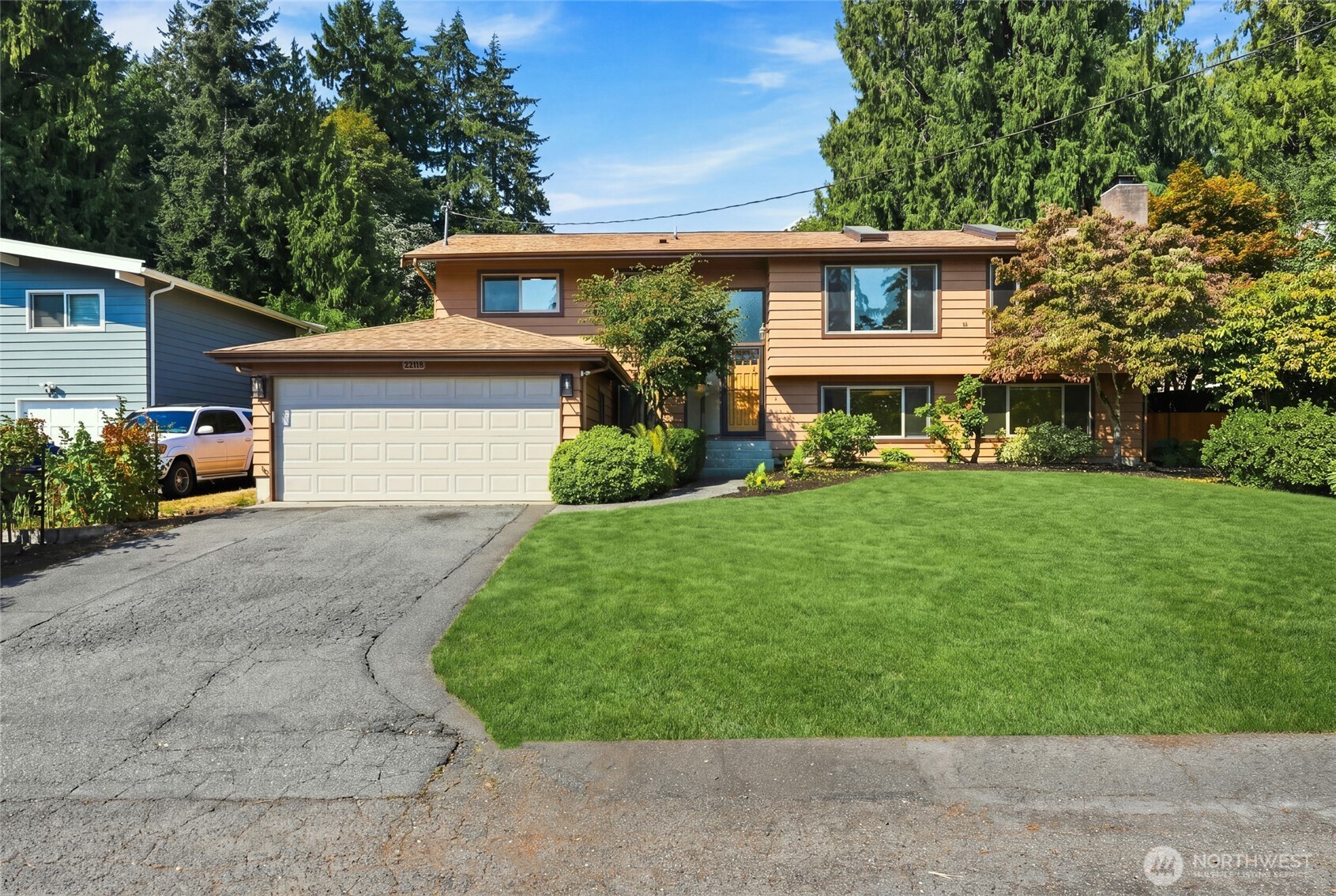 First time on the market ever! Welcome to this well-maintained home in the established Hadley Acres neighborhood, lovingly cared for by the same owners for more than 18 years. Offering one of the largest floor plans in its competitive set, this home features spacious living areas on both levels with plenty of room to spread out, entertain, and make it your own. The main level offers a bright and inviting living space, inviting kitchen with ample storage, and comfortable bedrooms. Downstairs, the fully finished basement adds incredible flexibility with space for a media room, home office, playroom, fitness area, guest space, or multi-generational living. Major improvements have already been completed, including a brand-new composition roof, fresh interior & exterior paint, and updated flooring, providing a wonderful head start for the next owners. A cozy fireplace, forced-air heating, attached two-car garage, and generous storage add to the home's everyday comfort and functionality. Situated on a desirable lot in a convenient Edmonds location close to shopping, dining, parks, and commuter routes, this is an exceptional opportunity to enjoy the home today while personalizing it over time. With abundant space, a flexible layout, and decades of pride of ownership, this special home is ready for its next chapter.