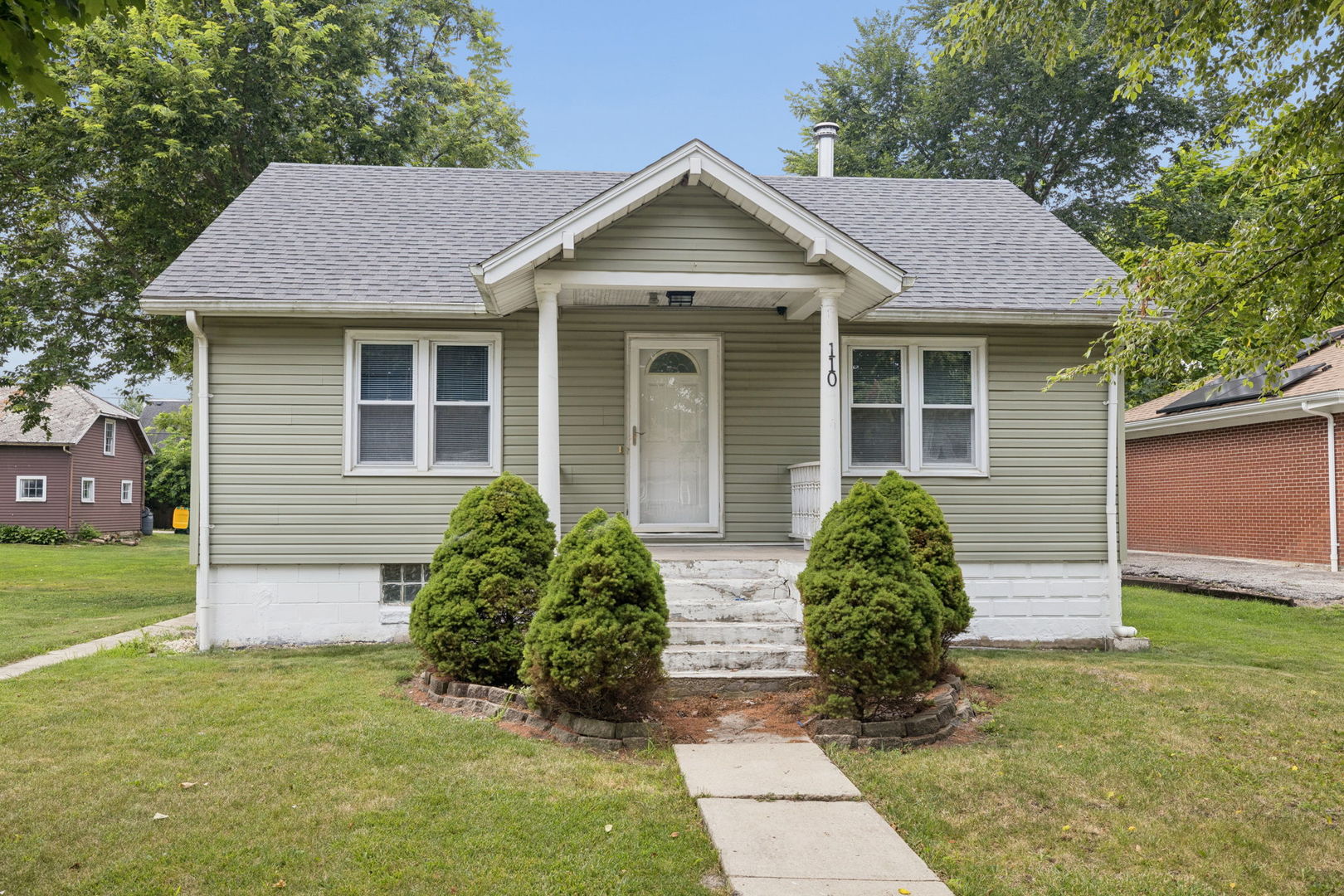 Don't miss this incredible opportunity to own a well-maintained home at a price that's becoming harder and harder to find! Nestled on a quiet street in the heart of Elwood, this charming 2-bedroom, 1-bath home offers more than meets the eye. The practical floor plan lives larger than its square footage, with hardwood floors throughout the living room and both bedrooms. The kitchen offers generous counter space, stainless steel appliances, and easy access to the living room, creating an open feel with just the right amount of separation. The full, unfinished basement offers endless possibilities for storage, a home gym, or future finished living space, with laundry conveniently located downstairs and newer washer and dryer included. Major updates have already been completed, including new windows, a newer roof on the house, garage, and shed, plus a new water heater. A full attic provides even more storage. Outside, enjoy the private backyard and detached 20x20 garage equipped with gas, ready for a heater. Affordable, move-in ready, and full of potential-this is one you won't want to miss!