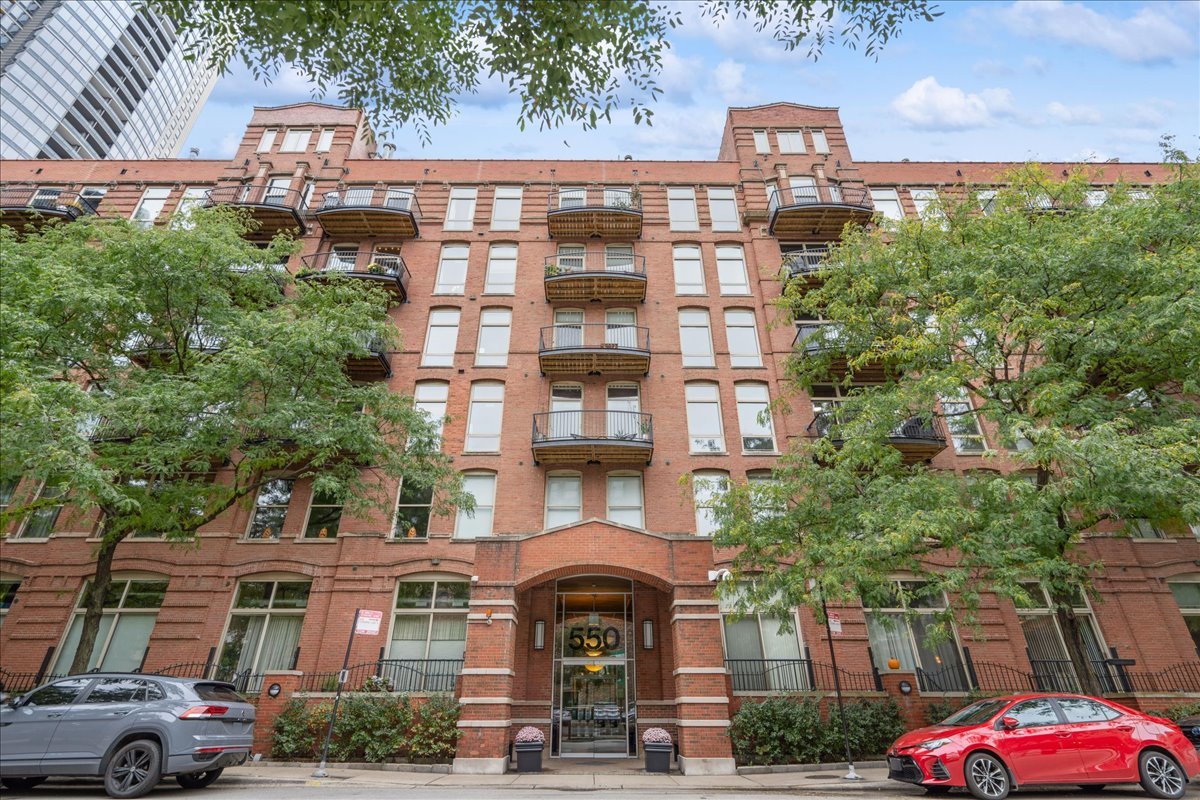 This Beautiful and Spacious 2BD/2BA in River North is ready to be your new home! Located on the riverfront, this stunning timber loft blends modern updates with authentic loft character, featuring exposed brick, timber beams, 11ft ceilings and dramatic floor-to-ceiling windows with direct river views. The open-concept kitchen offers custom cabinetry, quartz countertops, glass tile backsplash, stainless steel appliances, and a large island with built-in wine cooler, perfect for entertaining. Two fully enclosed bedrooms with California style closets and two full bathrooms, including a spacious primary suite with Jacuzzi soaking tub. Directly attached to the unit, a private balcony overlooking the river. Very Rare 21' x 15' storage/rec room with high ceilings located on the same floor near unit! Incredible extra space that can be utilized in many creative ways. AC (2023), Water heater (2023), and in unit Washer/Dryer (2022). Full-amenity building with 24/7 door staff, fitness center, rooftop deck, art gallery lobby, dry cleaner, and on-site management. Steps to East Bank Club, riverwalk, dog parks, restaurants, and expressway. Two deeded parking spaces being sold with the unit: covered garage space $25K and uncovered space $15K. Seller prefers parking sold with the unit. No Rentals are allowed in this building.