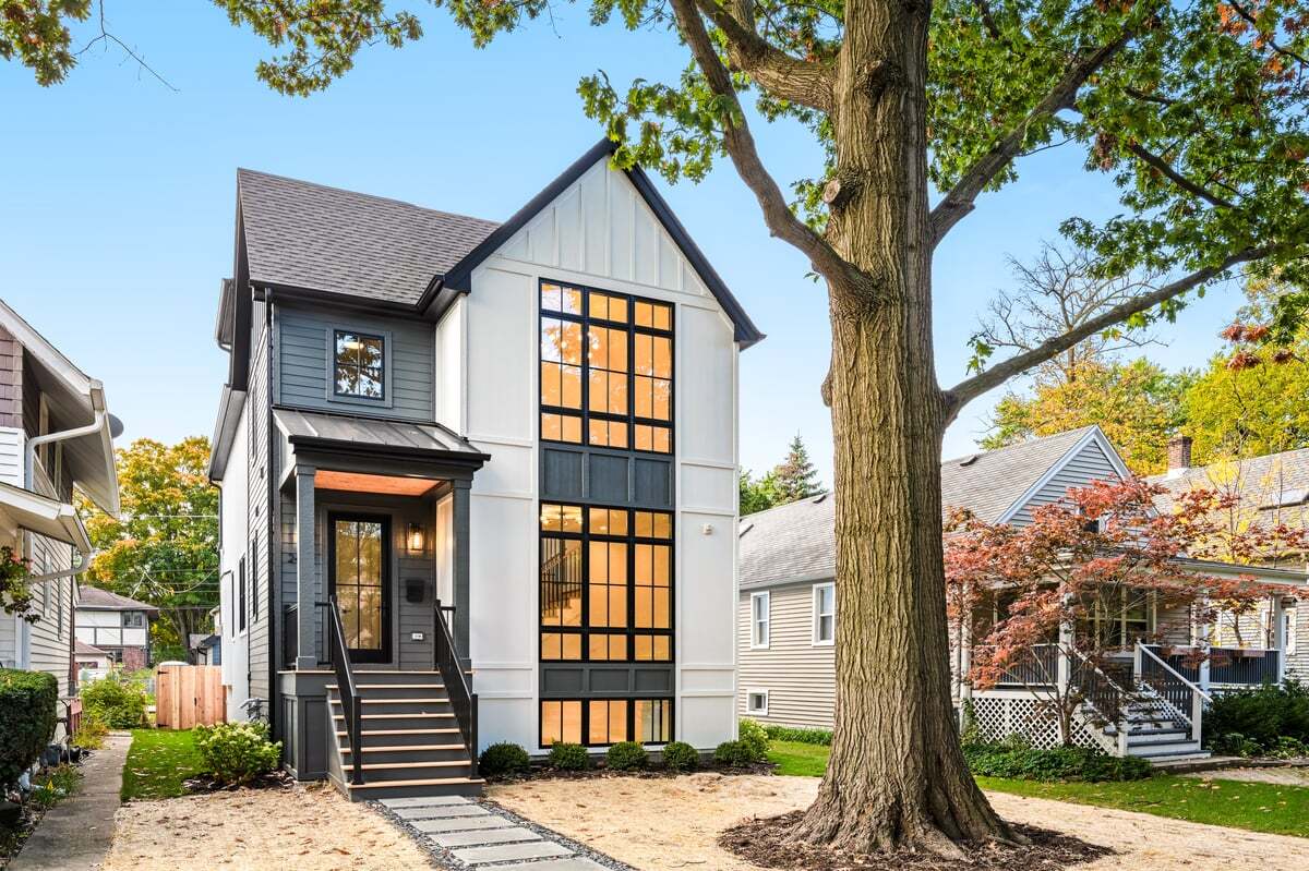 Exquisite newly built custom home in the heart of Northwest Evanston. Experience the perfect blend of modern sophistication and timeless design in this newly constructed luxury residence, nestled on a tree-lined street in one of Evanston's most desirable neighborhoods. This home showcases exceptional craftsmanship and high-end finishes throughout, including an open-concept floor plan with soaring ceilings and wide-plank white oak hardwood floors, chef's kitchen with an expansive island, quartz countertops, and premium Thermador appliances. Thoughtful design details with minimalist elegance, sophisticated trim work, and abundant natural light.    Additional highlights include: two HVAC systems with high-efficiency equipment and Wi-Fi-enabled smart thermostats.  Whole-house fire suppression system for added peace of mind.  Oversized Pella wood/aluminum-clad windows and James Hardie siding.  Spacious deck overlooking a private backyard, perfect for entertaining. Two car garage with additional attic storage and EV fast-charger readiness.  Located just moments from the lakefront, parks, schools, shopping, dining, and public transportation, this home offers an unparalleled lifestyle in a vibrant community.  Welcome to your own piece of paradise.