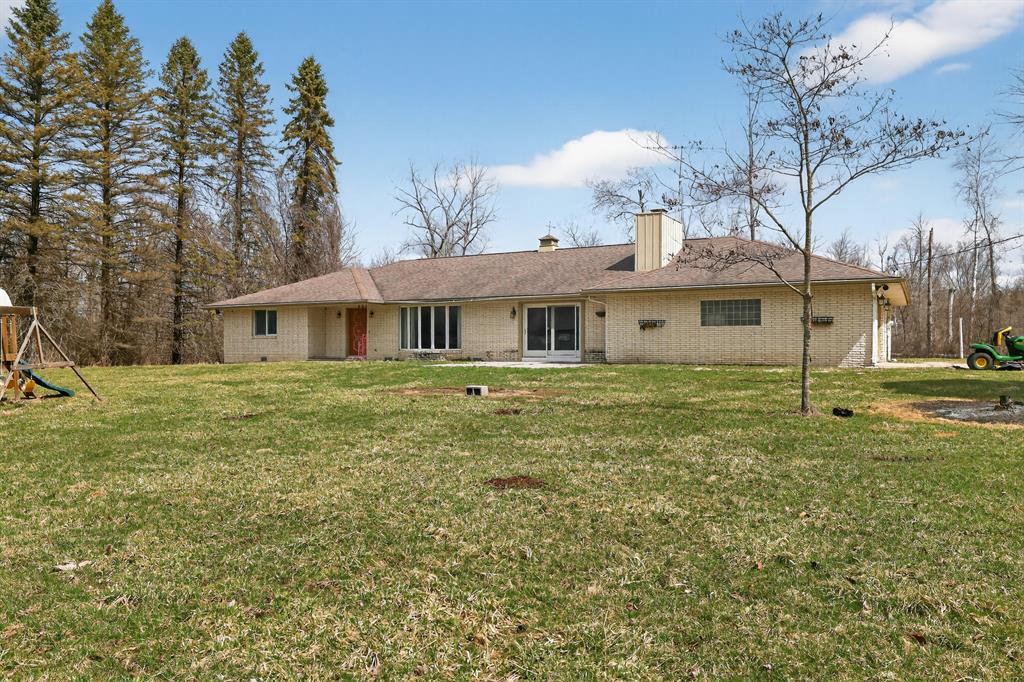Three bed two bath ranch home with an attached garage on 10 acres