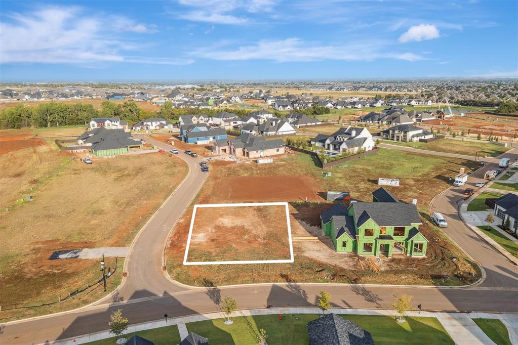 Located within The Manors at Annecy, this exceptional homesite provides an ideal backdrop for crafting your dream home. The community offers a tranquil setting with wooded green spaces and meandering trails that invite both relaxation and connection. Located within the highly regarded Deer Creek School District, this neighborhood offers the perfect mix of convenience and quality living. Ideally positioned near the Kilpatrick Turnpike, Gaillardia Golf Course, and an array of restaurants, grocery stores, and shopping options. Start building your dream home today! The Manors at Annecy features a preferred list of builders — please verify the current approved list.