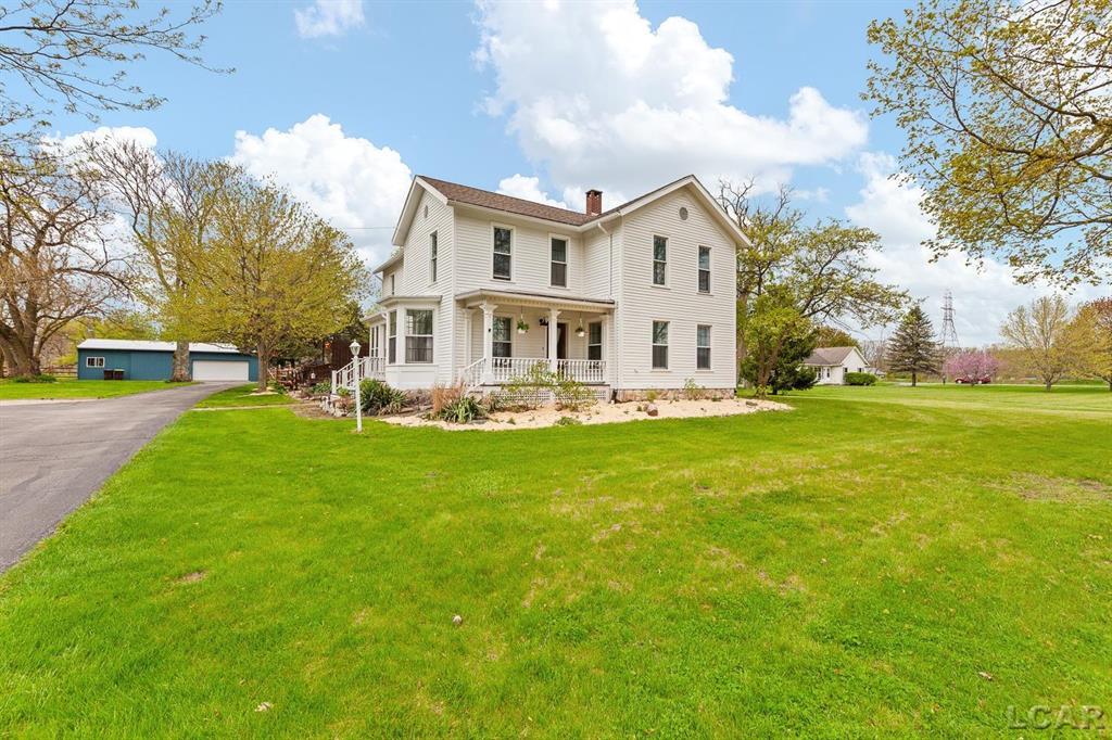 Welcome to 6518 N Rogers Hwy, Tecumseh - a beautifully updated country residence blending modern conveniences with historic charm. This spacious 5-bedroom, 2-bath home is ideal for large families and entertaining. Highlights include a chef's kitchen with a Viking range, generous main living areas, and approximately 2,000 sq ft of finished basement living - featuring a theatre room and dedicated exercise room. Outdoor living shines with an expansive deck that includes two gazebos, a hot tub, and an above-ground swimming pool. Ample yard space for gardening or keeping chickens, plus a 24' x 48' pole barn with room for three vehicles and workshop/storage space. Situated on a large lot yet close to town, this property offers the perfect balance of country privacy and everyday convenience. New furnace fall of 2025. Don't miss the opportunity to make 6518 N Rogers Hwy your new home - schedule a showing today!