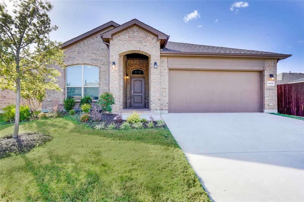 Welcome to this beautifully maintained home built in 2019, featuring numerous upgrades and stylish finishes throughout! Wood-look tile flooring flows seamlessly throughout the home, offering both elegance and easy maintenance. The spacious kitchen features granite countertops, a large center island, abundant cabinetry, and an open layout overlooking the inviting living area, perfect for entertaining and everyday living. Generously sized secondary bedrooms provide comfort and flexibility, while the secondary bathroom features an upgraded tiled shower and additional storage. The spacious primary suite offers a private retreat with an ensuite bathroom featuring dual sinks, a separate shower, a relaxing garden tub, and a large walk-in closet. Step outside to enjoy your morning coffee or unwind in the evenings under the covered patio. Conveniently located just minutes from major highways, shopping, dining, entertainment, and schools. With its thoughtful upgrades, functional layout, and desirable location, this home is ready for its next owner. Roof was replaced on June 2021. Schedule your showing today!