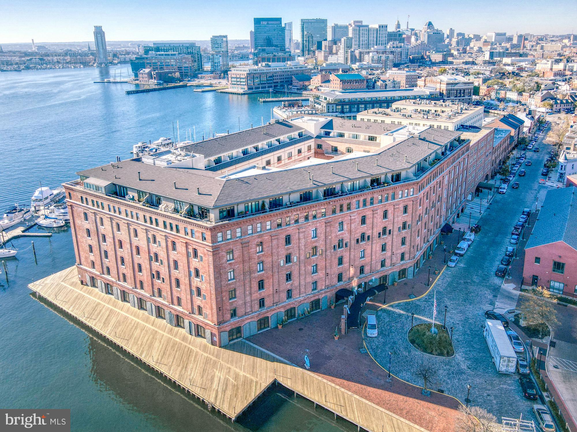 Welcome to 1000 Fell Street #628, a modern and stylish condominium located in the heart of Fells Point, one of Baltimore's most vibrant and historic neighborhoods. This beautifully maintained residence offers a fantastic opportunity to experience the best of city living, with its convenient location, modern amenities, and stunning views. The main level features a generously sized primary suite that offers a peaceful retreat with its modern ambiance and ample closet space. The bathroom is tastefully designed, featuring modern fixtures and a luxurious, oversized shower providing a spa-like experience. The second bedroom features built-in storage and a modern ensuite bathroom. Laundry is located on this bedroom level for absolute ease. The upper level of this well-appointed condo features an open and spacious living area that is flooded with natural light. The open floor plan seamlessly connects the living room, dining area, and kitchen, creating an ideal space for entertaining family and friends. The living room features large floor to ceiling glass doors allowing for breathtaking views of the surrounding neighborhood & Inner Harbor. The kitchen is a chef's dream, boasting sleek stainless steel appliances, granite countertops, and ample cabinet space. Whether you are preparing a quick meal or hosting a dinner party, this well-designed kitchen provides the perfect setting to showcase your culinary skills. Versatile flex space perfect for a home office, den, or yoga space complete with floor to ceiling glass doors with access to the large terrace. A third full bathroom with beautiful tile surround shower round out this truly unique property. Situated in the heart of Fells Point at Hendersons Wharf, this residence offers an unbeatable location. Explore the charming streets lined with historic row houses, boutique shops, and award-winning restaurants. Immerse yourself in the local culture, attend neighborhood festivals, or take a leisurely stroll along the waterfront promenade. Whether you work in the city or desire to explore the surrounding areas, this location provides an ideal starting point. Don't miss the opportunity to make 1000 Fell Street #628 your new home. Experience the vibrant energy of Fells Point, the modern comforts of this exceptional condominium, and the convenience of urban living at its finest. Schedule a showing today and envision yourself living in this remarkable residence.