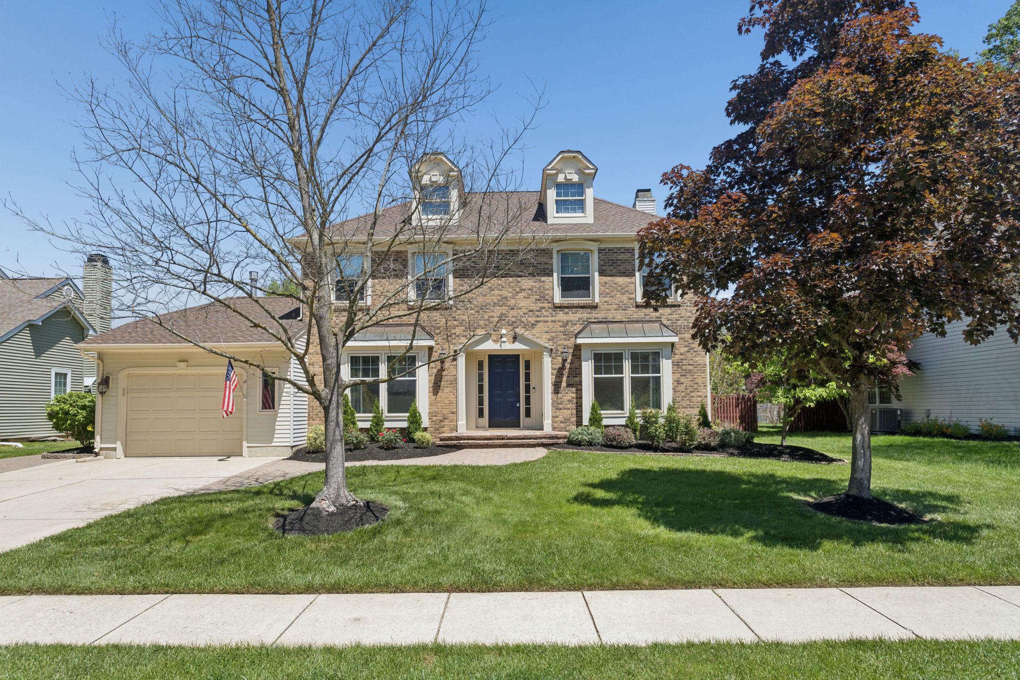 Welcome home to this beautifully updated 4-bedroom, 2.5-bath Colonial in the desirable neighborhood of Michaelsons Gate! This charming property features a classic brick front with vinyl siding and fantastic curb appeal. The garage has plenty of storage room.Step inside to find all-new luxury vinyl plank flooring throughout the first floor and freshly painted. The bright and inviting living room showcases recessed lighting and elegant crown molding, while the dining room offers crown molding and custom woodwork—perfect for entertaining.The fully updated kitchen is a standout, featuring quartz countertops, white cabinetry, a center island, new appliances including refrigerator, microwave, dishwasher, gas stove, and garbage disposal. The breakfast area provides a cozy space for casual dining. Just off the kitchen, the family room boasts a brick wood-burning fireplace and sliding doors that lead to the backyard.Enjoy outdoor living on the stamped concrete patio overlooking a private, vinyl-fenced yard with a spacious play area—ideal for gatherings and relaxation. A versatile media room off the kitchen can serve as a home office or playroom.Upstairs, the primary suite offers two walk-in closets and an upgraded en-suite bath with double sinks, a walk-in shower, and the convenience of a separate washer and dryer. Three additional bedrooms feature ceiling fans and generous closet space.This welcoming home is filled with natural light, thoughtful upgrades, and plenty of space. Conveniently located near major highways, shopping, dining, and top-rated schools, it’s a must-see!