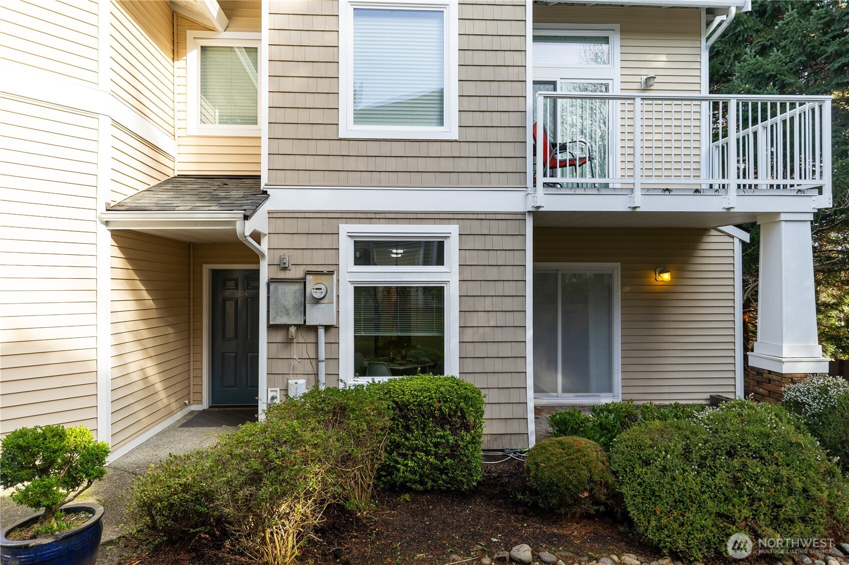 Bright, ground-floor end-unit 2bed 2full bath condo offering a no-stairs layout and private attached garage for easy, convenient living. Open-concept great room features a cozy fireplace and flows seamlessly to a private patio—ideal for relaxing or entertaining.   The kitchen includes ample cabinet space and an eating bar. Spacious primary suite offers a walk-in closet and private bath with double sinks. washer and dryer included. Enjoy community amenities, nearby trails, and a private setting with excellent commuter access. A perfect blend of comfort, convenience, and lifestyle.