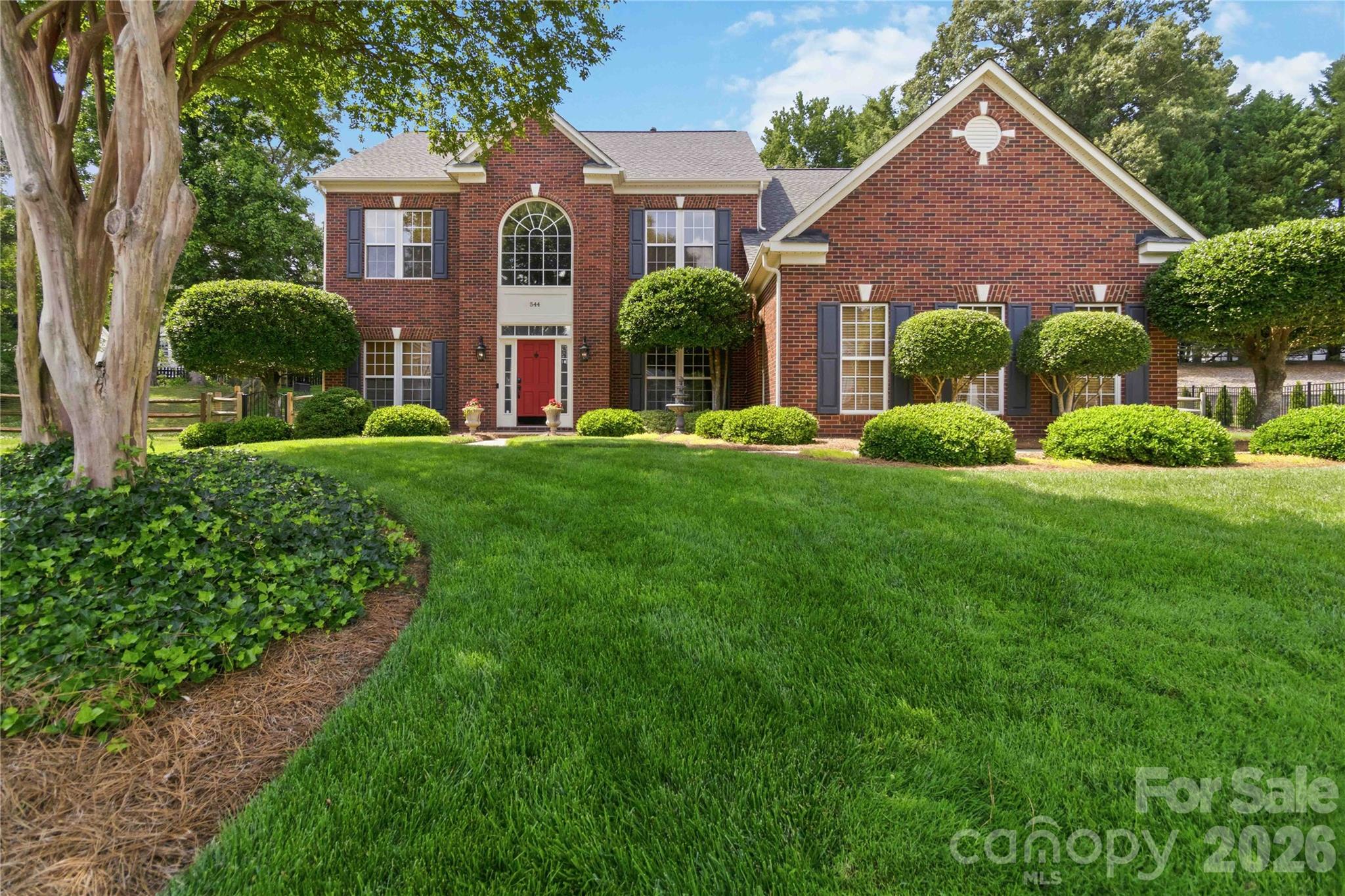 This is the one buyers have been waiting for! Meticulously maintained and extensively updated inside and out, this immaculate home offers exceptional indoor and outdoor living on a beautiful cul-de-sac lot with lush lawn, mature landscaping, and multiple entertaining spaces designed for year-round enjoyment.The backyard is truly a showstopper featuring an oversized 21.5’ x 12’ covered porch complete with oversized ceiling fan and TV mount, flanked by two additional decks for expanded outdoor living. One deck showcases a large propane firepit with built-in U-shaped seating, creating the perfect gathering space for relaxing evenings and entertaining guests. The tiered backyard leads to an additional flat yard area ideal for a playset, cornhole, or recreation space.Inside, virtually every inch of the home has been thoughtfully updated with quality finishes and custom details throughout. The beautifully renovated kitchen serves as the heart of the home and features a large center island, quartz countertops, stacked stone backsplash, and updated stainless steel appliances. The spacious great room with gas log fireplace, crown molding, and chair rail accents easily accommodates large gatherings while maintaining warmth and comfort.The well-designed laundry room offers extensive cabinetry, quartz utility sink, folding station, tile flooring, stacked stone backsplash, and front-load washer and dryer positioned perfectly beneath the workspace. Car enthusiasts will appreciate the impressive 3-car garage featuring custom cabinetry storage systems and durable epoxy flooring.Additional updates and features include:LVP flooring throughout most of the main level and additional updated flooring (2026)Seller replaced plumbing with PEX-B piping (2019)All glass/windows replaced throughout the home (2023)Both HVAC systems fully replaced (2021)Extensive custom trimwork throughoutLuxuriously updated primary bath (2023) featuring frameless glass shower, updated tile flooring and tub surround, and quartz countertopsPowder room renovation completed (2025)This highly desirable community also offers a neighborhood pool and vehicle storage, all while providing convenient access to shopping, dining, gas, and I-77 for an easy commute and everyday convenience.