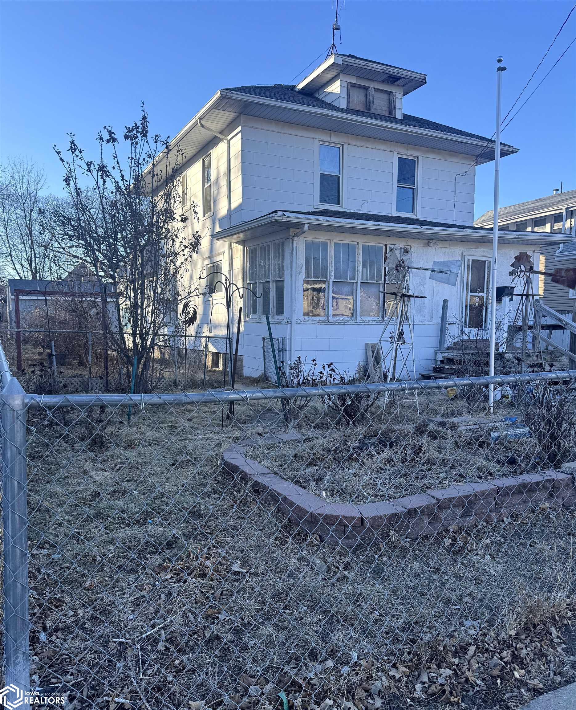This 3-bedroom, 2-bath, 2-story home is being sold as-is on online ABSOLUTE Auction, offering endless potential for the right buyer. The main floor and upstairs feature beautiful woodwork, adding charm and character. Recent updates include a steel roof on the back part of the home.  The property also includes a generously sized garage in the backyard with recent siding on as well as roof and all 3 new garage doors , perfect for parking vehicles or creating a spacious workshop. Whether you're looking to renovate and make it your own, use it as a rental property, or flip it, this home offers multiple possibilities.  Don’t miss this incredible opportunity—bid now and make it yours!
