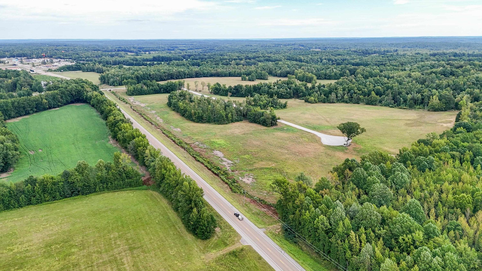 171.815+/- acres of Commercial/Residential property just off I-40 Interstate in Holladay, TN. This is one of the hottest exits in this area with a high traffic count for businesses. All utilities available. This is the ideal investment opportunity for Commercial and industrial use with Highway 641 frontage and new development in sight of property. Conveniently located approximately 50 minutes from Jackson, TN, 1 hours and 15 minutes from Nashville, TN, and just under 2 hours from Memphis, TN. Location, Location, Location! Don't miss your opportunity to own your own Commercial/Residential property today!