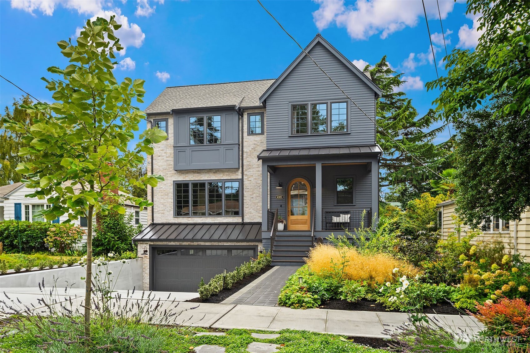 Sophistication, quality & style in Hawthorne Hills! Built in 2025 with no detail overlooked, this contemporary jewel hits every high note:a circular floor plan with warm engineered hardwoods flowing throughout, a versatile home office, energy-efficient systems (including A/C), smart built-ins, & light-filled living spaces accented by 10' ceilings & plentiful windows. The jaw-dropping kitchen with double dishwashers will have you daydreaming of opportunities to host, anchored by a massive quartz island & bar seats to watch the chef at work. The huge butler's pantry keeps everything orderly with abundant storage, a beverage fridge & prep sink. Retreat upstairs to the generous primary suite, complete with a 5-piece spa bath, heated floors & the walk-in closet of your dreams. 3 addl beds, 1.75 addl baths & convenient laundry room with double washer/dryers round out the upper floor. Downstairs you'll find a huge storage room, mudroom, garage access & a legal ADU for added flexibility. Use the space as a rental (with entry separate from the main home), a guest space, or an extension of the living areas: 9' ceilings, a large family/rec room, 2nd kitchen, a 5th bed & 3/4 bath. Outside, a backyard oasis awaits: a large covered deck w/ heater overlooks the fenced pet-friendly turf yard w/ thoughtful landscaping & a sauna + private outdoor shower. Pristine, move-in ready & ideally located for those who want that rare balance of peaceful living w/ everything you may need just mins away.