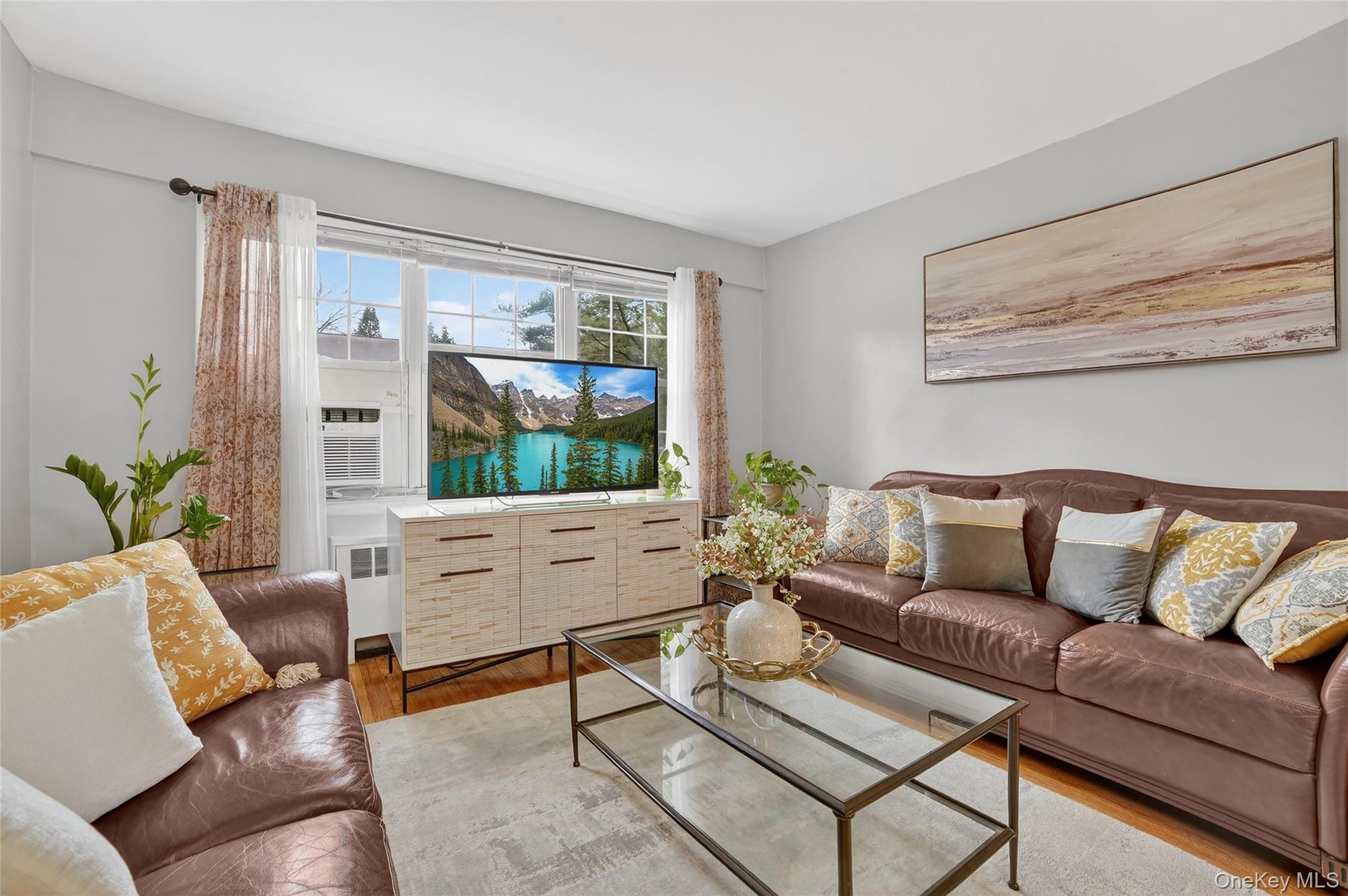 Fresh, Bright, and Full of Character - WHERE YOUR STORY CONTINUES… Move right into this beautifully updated 3-bedroom, 1.5-bath first-floor garden-style co-op offering the perfect blend of space, natural light, and modern convenience. This move-in ready home features three-sided sunlight exposure (north, east, and west), filling the interior with bright, inviting light throughout the day. As a Savvy Home Buyer, you want a lot from their next home. Here’s your chance to have your cake and eat it too!PRIVATE PARKING, IN-HOUSE WASHER AND DRYER, PRIVATE IN-GROUND POOL, PRIVATE PLAYGROUND, PATIO BBQ AREA, WELL LANDSCAPED GROUNDS, AND SNOW REMOVAL - YOUR NEW HOME WILL HAVE IT ALL. MAINTENANCE INCLUDES PROPERTY TAXES!Inside, you’ll find hardwood floors, a spacious living room, and a formal dining area ideal for entertaining or everyday living. The updated kitchen includes stainless steel appliances, quartz countertops, and an eat-in area, along with the added convenience of in-unit laundry. Updated bathrooms provide a clean, modern finish.Enjoy access to a well-maintained community with landscaped grounds, a courtyard for outdoor dining and BBQs, a private in-ground pool, and a playground. Additional features include private parking (short waitlist).Ideally located near Metro-North with approximately a 35-minute commute to NYC, and close to major highways, shopping, restaurants, nightlife, golf courses, and walking trails.Pet policy allows one indoor cat. Subletting permitted after 3 years of occupancy (up to 5 years).Don’t miss your chance to experience comfort, convenience, and community all in one - Schedule your private showing today and experience this move-in ready home in a prime, commuter-friendly location.
