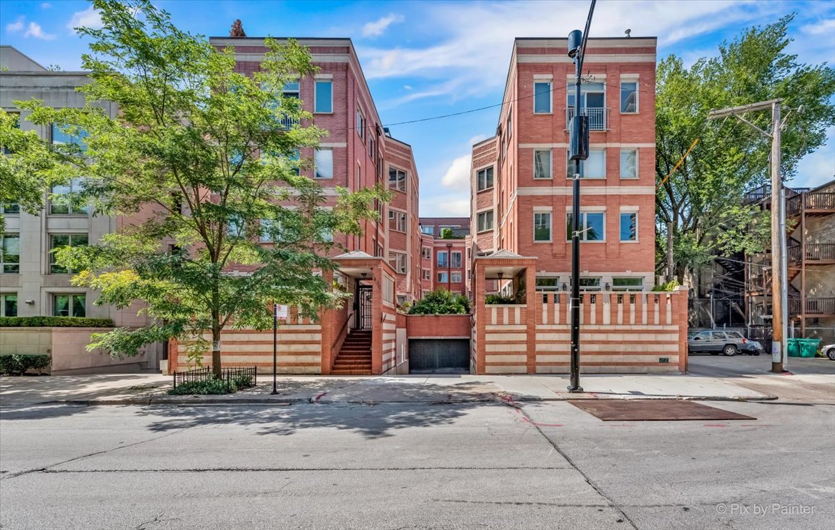 Location jackpot- Steps from everywhere you want to be! Must-see spacious two-story townhouse located in the heart of the Gold Coast/Old Town!  The professionally landscaped courtyard of this 14-unit complex offers privacy and quiet in the middle of the city.  Townhome features 2 bedrooms, 2.5 baths and an office/den plus a large private patio.  Highlights on the main level of this townhouse include expansive open floor plan with hardwood floors throughout. Kitchen features a breakfast bar with additional seating, stainless steel appliances, granite counters, wine bar, ample cabinet storage space and large pantry all opening to a separate dining area that leads to a family room with gas fireplace.  The 2nd floor features a spacious master bedroom with walk-in closet and ensuite bathroom, a second large bedroom, also with walk-in closet and ensuite bathroom, and an office/den and laundry room with washer & dryer in unit.  Townhouse has plenty of closet space for all your storage needs.  If it's entertaining you enjoy, your guests will love the huge 29 x11 private patio area.  A wall of windows makes for perfect entertaining inside & out. Townhome is located steps from fabulous restaurants, great nightlife and public transportation and is only a short walk to the Lake front, North Ave beach, Mag Mile and Lincoln Park.  One-car, heated garage included with purchase. Hurry this will not last long!