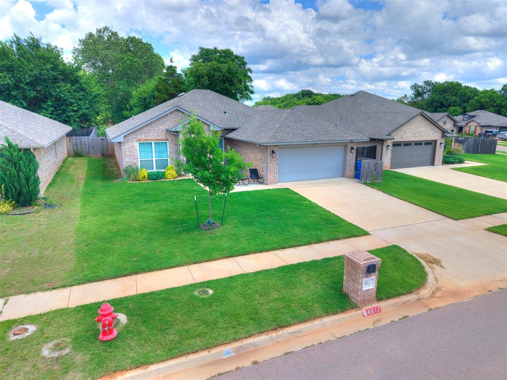 Welcome to 4617 Osprey Drive in Norman! Conveniently located near OU, shopping, dining, interstate access, and a nearby golf course, this nearly new one-owner home built in 2021 offers thoughtful upgrades and a functional layout designed for everyday living.  Upgrade features include extended front and back patios, full privacy fence, window treatments, new kitchen stone countertops, and easy-to-maintain hard surface flooring throughout the main living spaces. A storm shelter in the garage adds extra peace of mind during Oklahoma storm season.The split floor plan offers home owner privacy with two secondary bedrooms and a shared hall bath on one side of the home, while the spacious primary suite is tucked away on the other and features a vaulted ceiling, double vanity sinks, garden tub, glass shower, and a large walk-in closet. The open main living area flows effortlessly into the kitchen, dining, and backyard spaces, making it ideal for relaxing or entertaining. The kitchen is well appointed with stainless steel appliances, a central island with additional counterspace, a  true pantry, and plenty of storage space making meal prep a breekze. The dedicated study with sliding barn door located near the front of the home makes working from home easy.Outside, enjoy a backyard that opens to green space with afternoon shade for year-round living, plus additional green space in front of the home. Solar panels to remain with the home adding additional perk of low energy cost. With its thoughtful upgrades, move-in ready condition, and competitive value this home is truly worthy of closer look.
