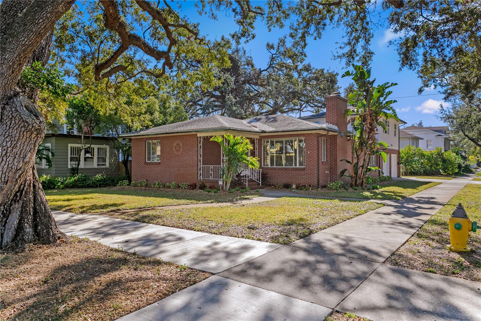 One or more photo(s) has been virtually staged. Charming 1950s brick home nestled in the heart of the historic Euclid St. Paul’s neighborhood! The main house features 2 spacious bedrooms, 2 full bathrooms, and 1,437 sq. ft. of comfortable living space. Situated on an oversized corner lot with lush landscaping, this property exudes character and curb appeal. A standout feature is the newly renovated 572 sq. ft. garage apartment, perched above the oversized 2-car garage. This modernized space boasts brand-new windows, updated electrical, stylish flooring, a beautifully remodeled kitchen with new cabinetry and appliances, and a sleek bathroom with updated lighting—perfect for guests, in-laws, or potential
rental income. This home combines timeless charm with thoughtful updates, offering a prime location close to restaurants, shops, parks, and everything the vibrant Euclid St. Paul’s area has to offer. Don’t miss your opportunity to own a piece of history with modern  
conveniences!