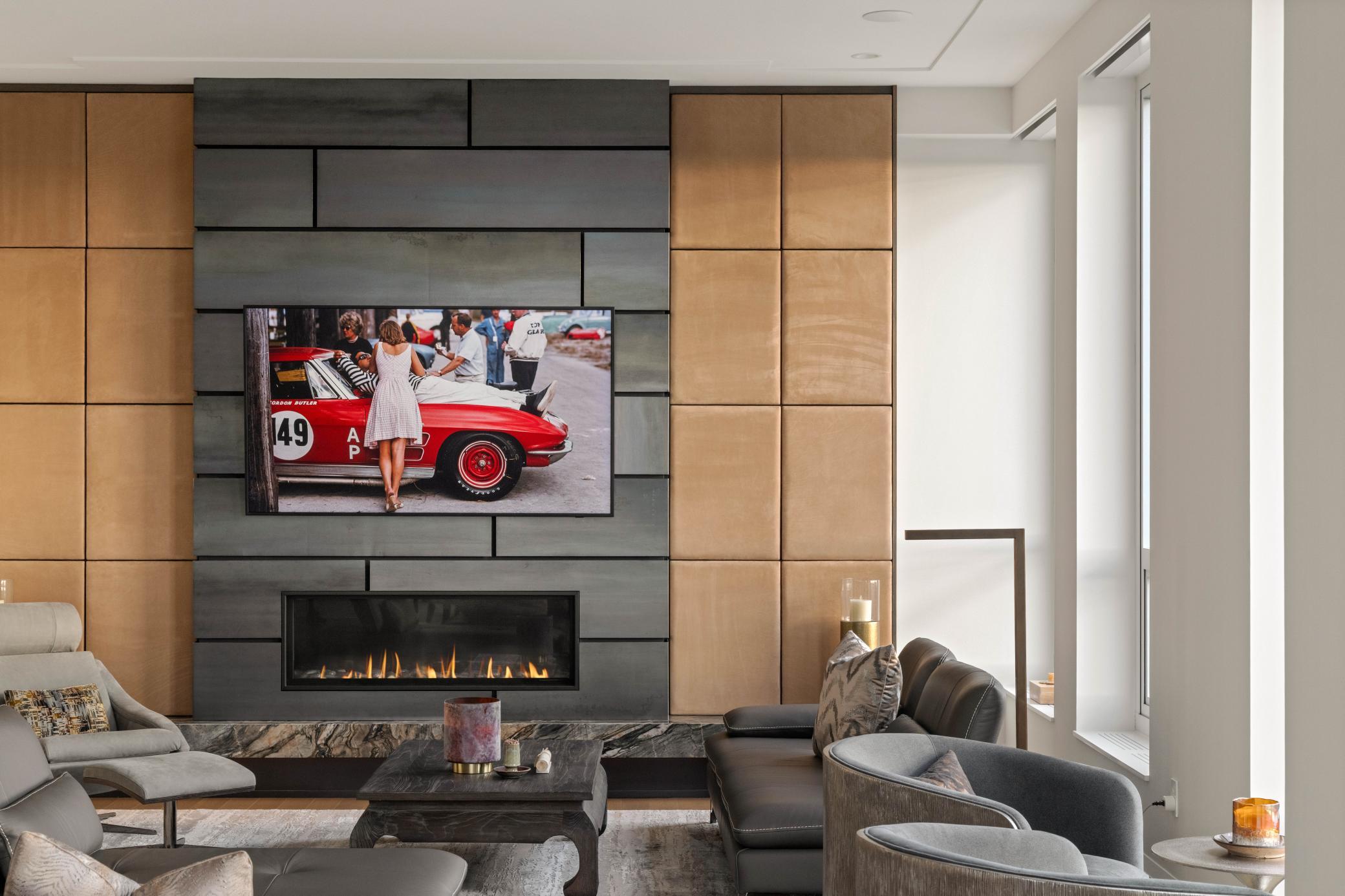 An extraordinary residence, this is the first fully bespoke and meticulously customized home, envisioned by renowned designer Greg Walsh of MartinPatrick3, to be offered for sale within the distinguished Eleven building. Every element has been intentionally curated and masterfully handcrafted, resulting in a living experience unlike anything the market has previously seen.Thoughtfully layered with rich materials, elevated textures, and uncompromising attention to detail, the residence embodies a rare level of artistry and distinctiveness. From custom finishes and tailored millwork to refined lighting and integrated technology, there are statement design moments throughout, every space was created with purpose — balancing sophistication, warmth, and timeless livability.Expansive floor-to-ceiling windows throughout capture abundant natural light and frame breathtaking vistas of the Mississippi River, Gold medal Park, and full city skyline. The great room and dining design inspire an intimate evening or gathering of 30 and the  impressive racetrack 11’ ft ceiling heights enhance the sense of space and grandeur throughout the residence. This is more than a welcoming home; it is a collectible piece of design where craftsmanship, vision, and functionality converge to create an offering truly without comparison.