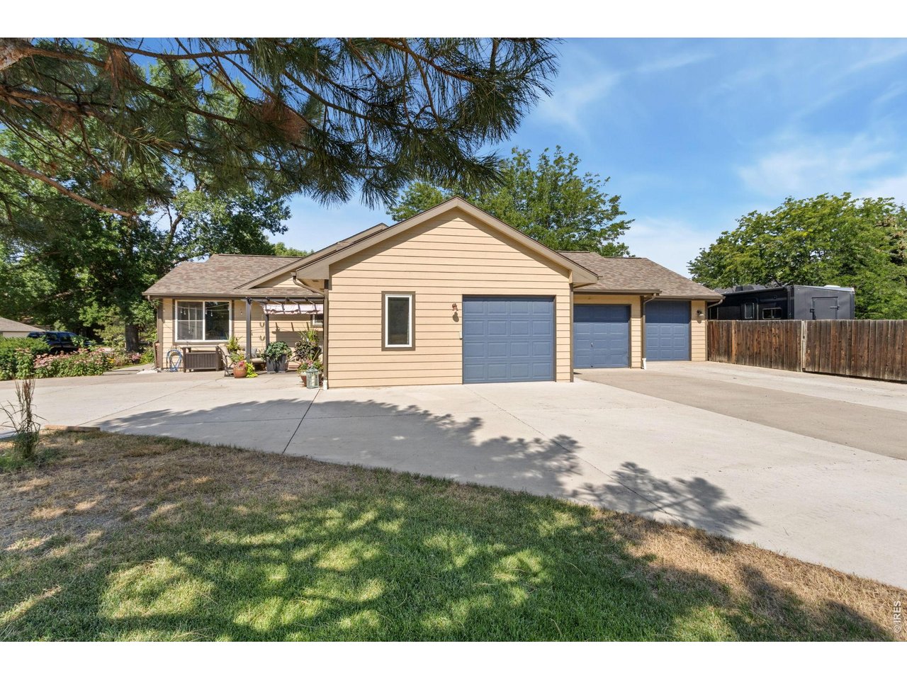 Don't miss this perfect sprawling ranch in Vista Bonita subdivision. It has an open floor-plan w/ central A/C and hardwood floors throughout. It features a spacious kitchen with granite tops throughout and a large granite island with a downdraft Jenn Air electric cooktop range new in 2023. Private primary bedroom retreat is away from the other bedrooms for added privacy and the main floor offers two additional bedrooms. Great dedicated space for an in-home business opportunity or large mud room. The spacious basement has a large rec and room two additional bedrooms and a bathroom. The large 3-car garage offers ample space for vehicles and a shop with an additional shed. Don't forget the RV/boat parking, Class-4 Impact resistant roof new in 2019, new dishwasher in 2022, new disposal in 2023, new Lenox furnace and A/C in 2022 and new water heater in 2025. An active radon mitigation system is in place. New gas fireplace installed in 2022. The spacious, fully fenced backyard offers privacy and a deck for your enjoyment. No HOA and outside city limits. There is direct access to Baker Lake for an annual fee of $65.00. Swimming, fishing and paddle boarding. Walking trails near the lake as well. 10 minute drive to Old Town Fort Collins. A wonderful, peaceful neighborhood with quick access to I-25.