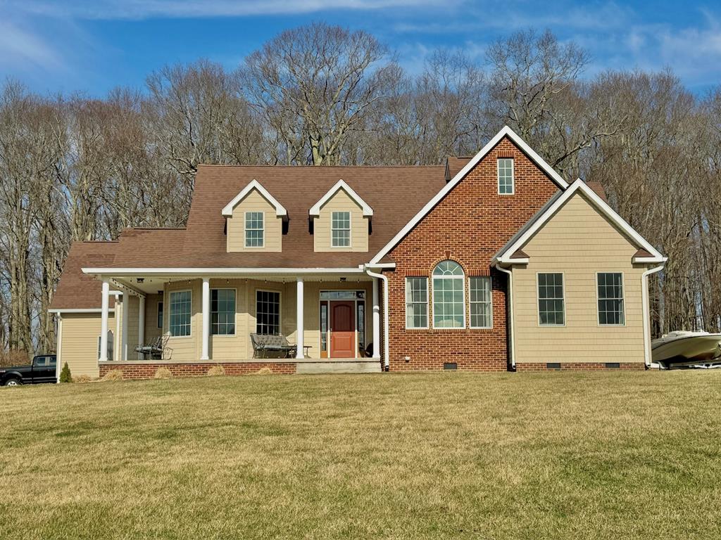 Beautifully maintained 3-bedroom, 2.5-bath home offering nearly 3,000 sq. ft. of comfortable living space on approximately 3 acres with stunning views. This spacious property features beautiful hardwood floors, generous living areas, and a bonus room above the garage that is perfect for a home office, playroom, or additional living space. Enjoy peace of mind with a whole-house generator, ensuring comfort and reliability year-round. The home also offers the convenience of both an attached garage and a detached garage, providing plenty of space for vehicles, storage, or workshop use. Situated on 3 scenic acres, this property provides the perfect blend of privacy, space, and breathtaking surroundings while still offering all the comforts of home. A rare opportunity to enjoy country living with room to grow and incredible views.